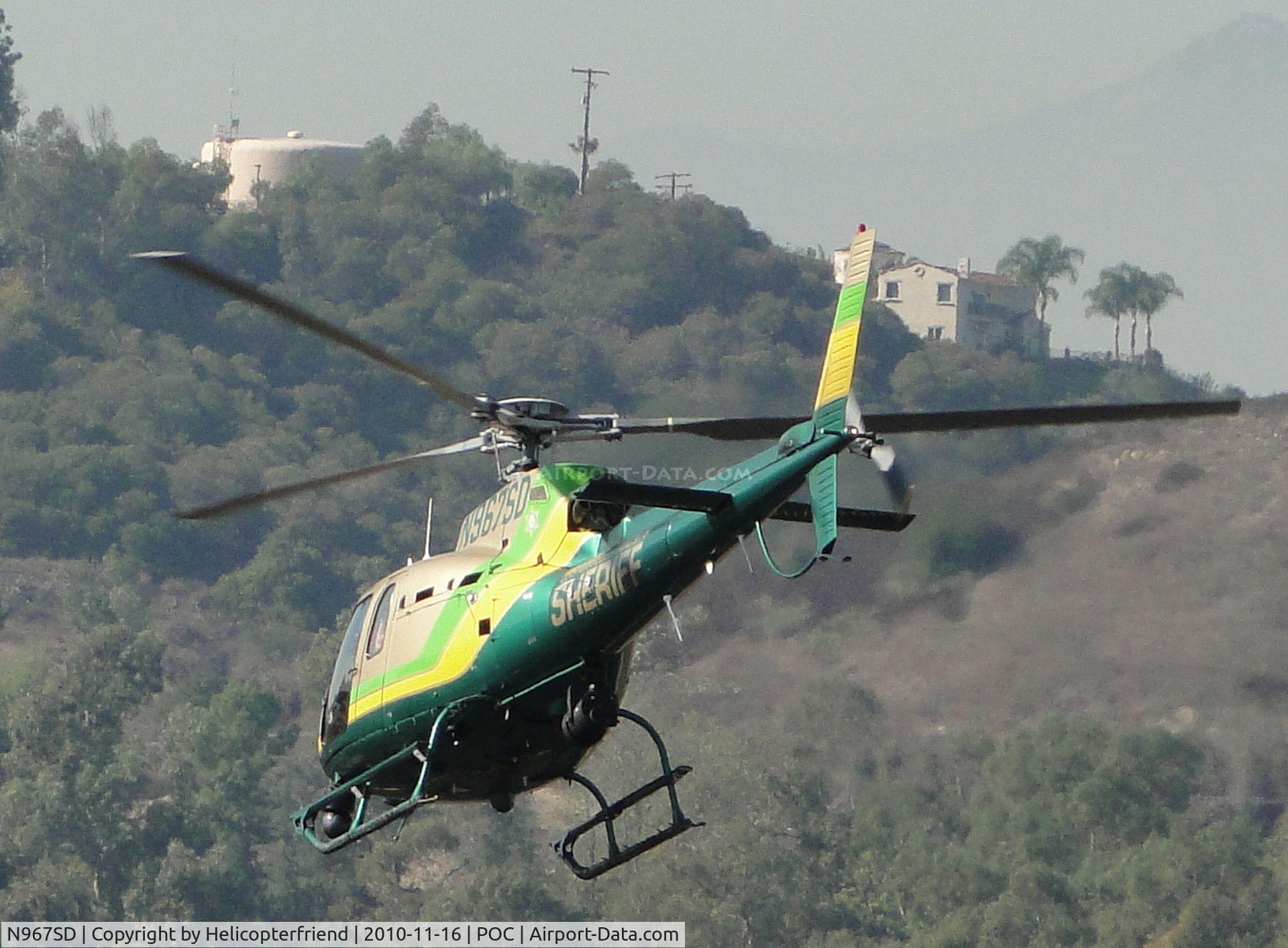 N967SD, 2003 Eurocopter AS-350B-2 Ecureuil C/N 3678, Passenger picked up and now departing westbound from taxiway Sierra
