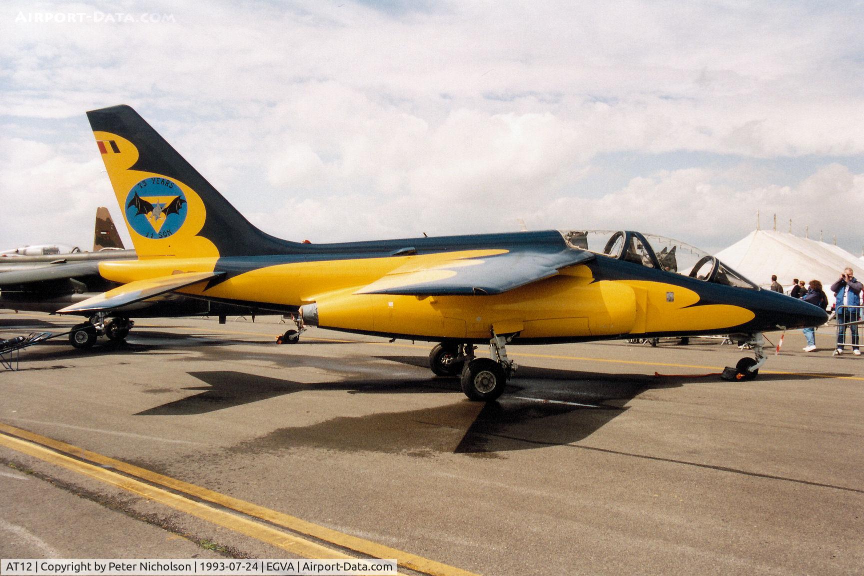 AT12, Dassault-Dornier Alpha Jet 1B C/N B12/1036, With anniversary markings celebrating 75 years of 11th Training Squadron, this Alpha Jet of the Belgian Air Force was on display at the 1993 Intnl Air Tattoo at RAF Fairford.