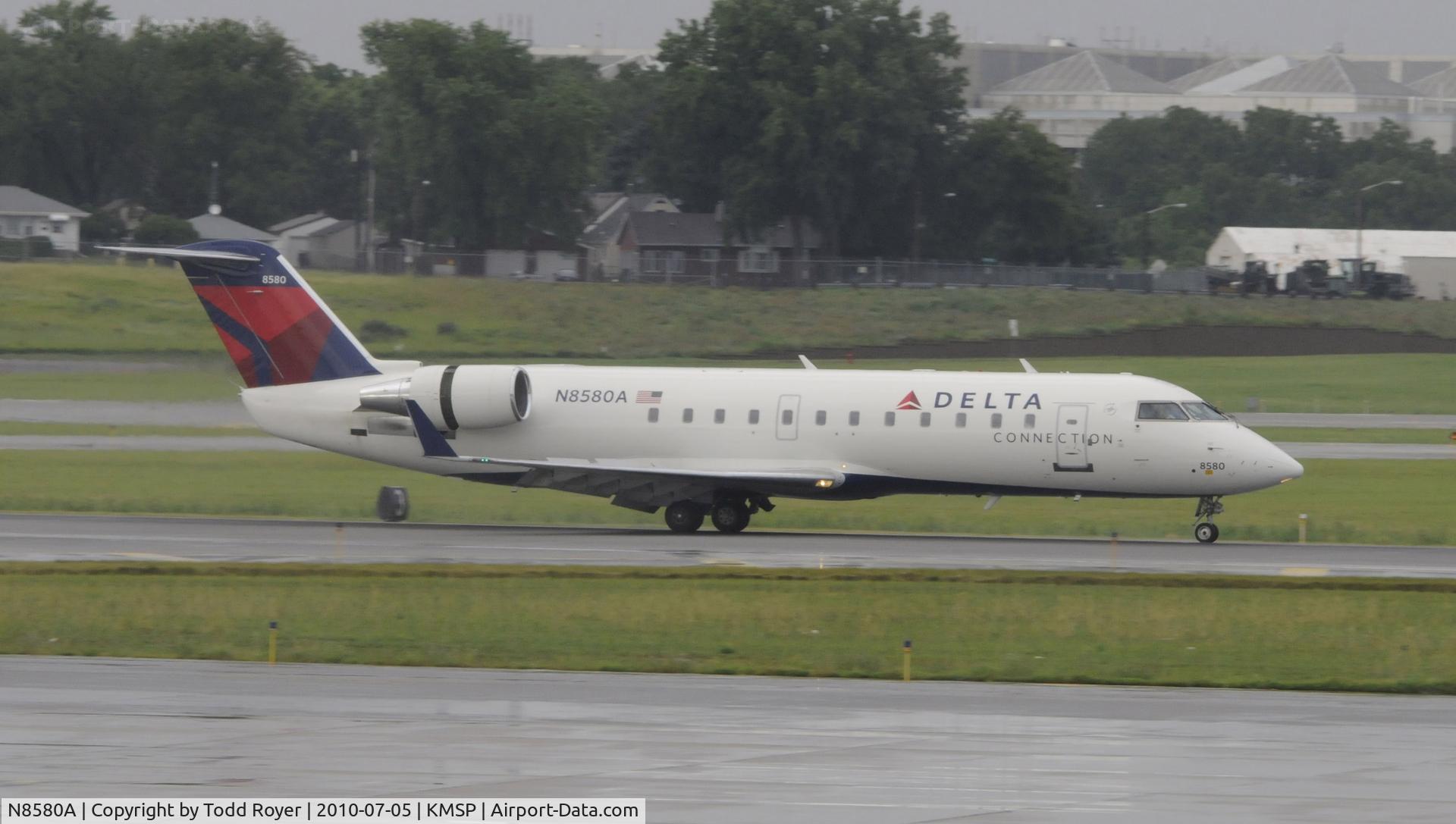 N8580A, 2001 Bombardier CRJ-200LR (CL-600-2B19) C/N 7580, Stormy day in MSP