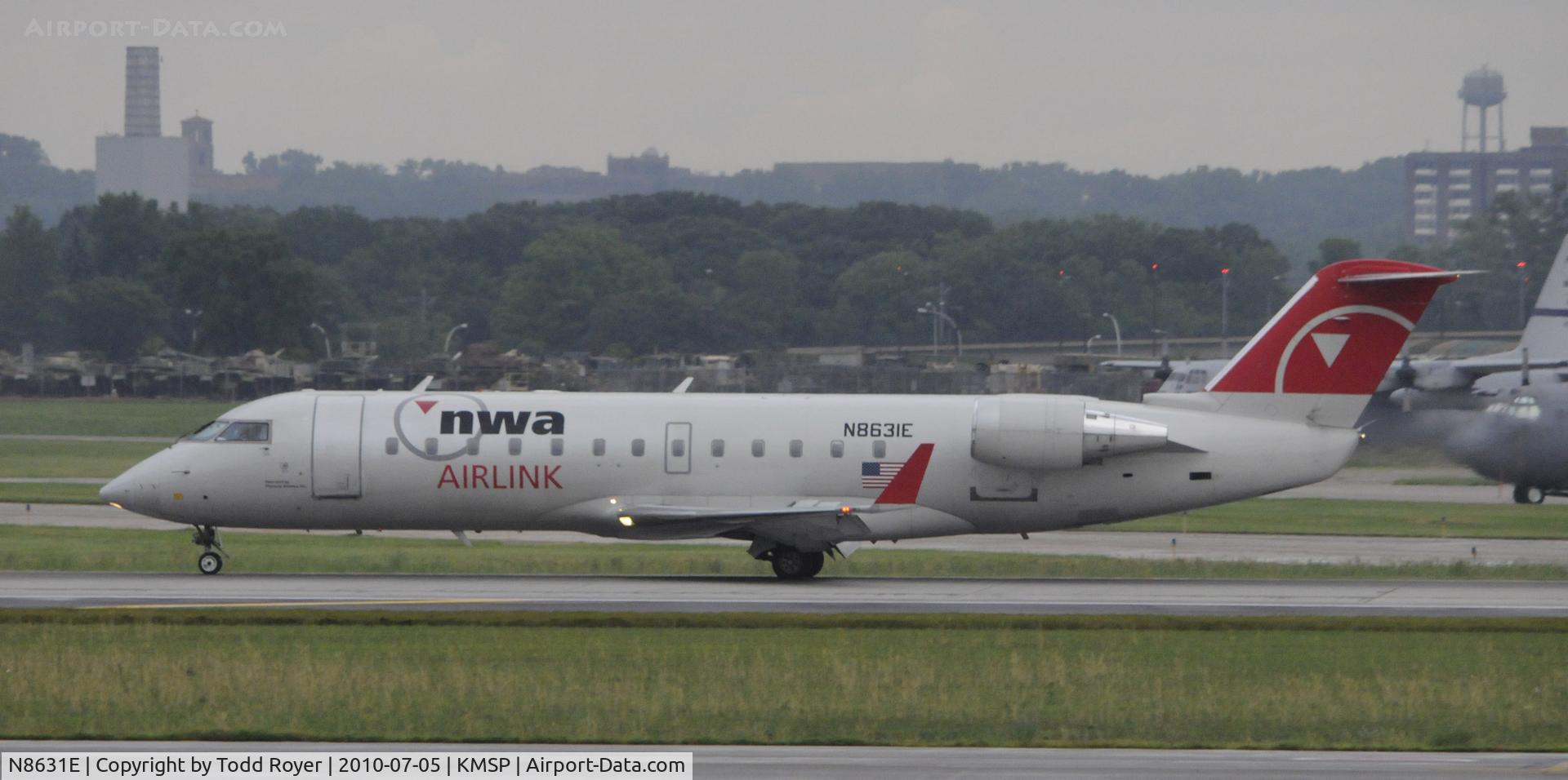 N8631E, 2002 Bombardier CRJ-200LR (CL-600-2B19) C/N 7631, Stormy day in MSP