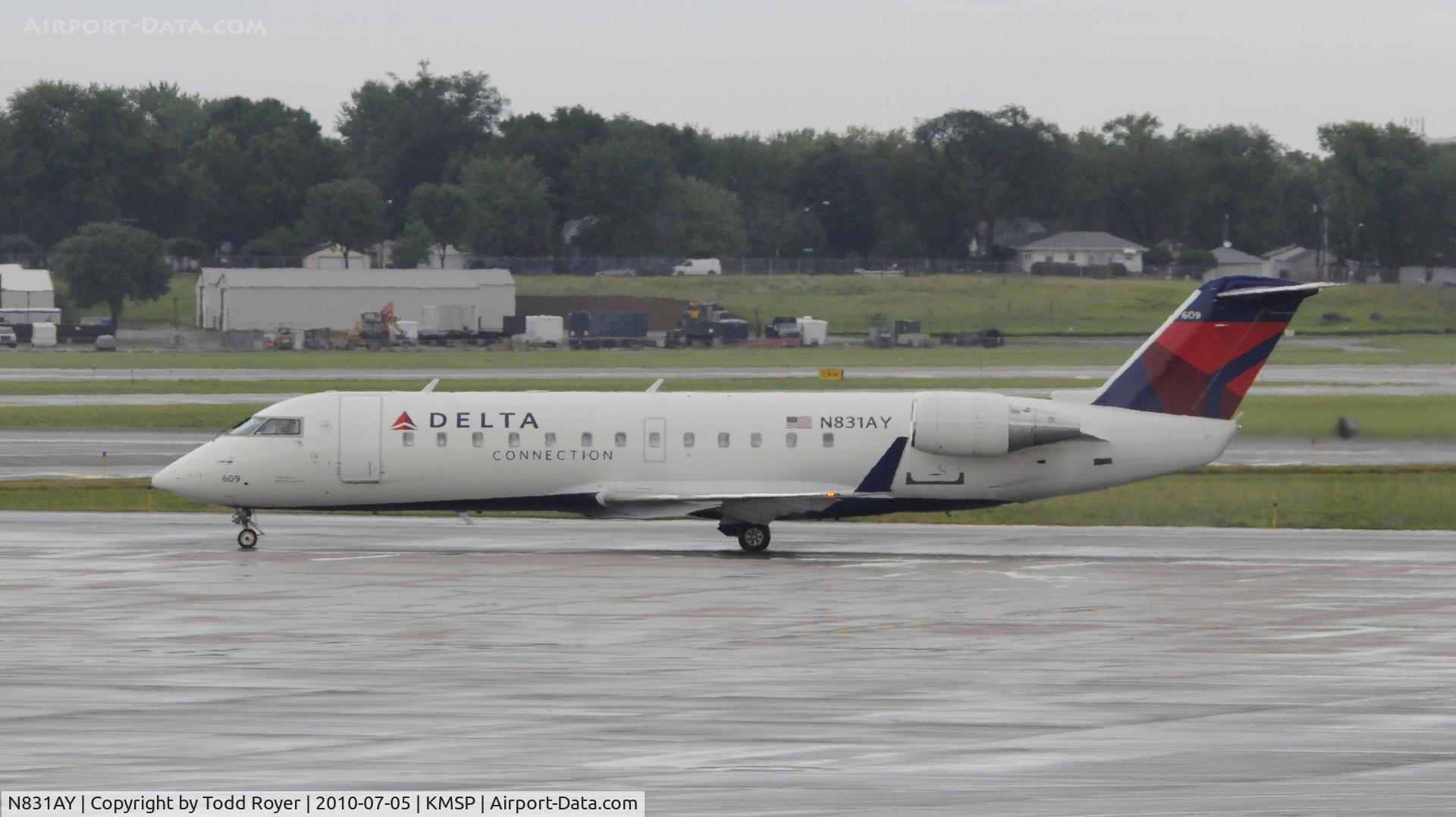 N831AY, 2005 Bombardier CRJ-200LR (CL-600-2B19) C/N 8031, Stormy day at MSP