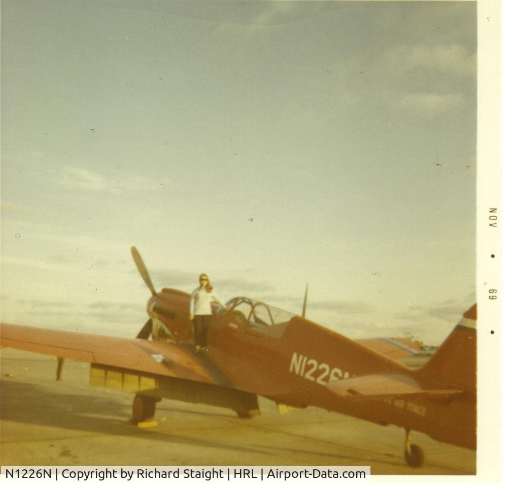 N1226N, Curtiss P-40N Warhawk C/N 29629, This photo was taken when we went to the CAF airshow at Harlingen, Texas in 1969. That's my wife standing on the wing. It's neat to see the same aircraft some 41 years ago and to have seen it recently at the Wings Over Houston Airshow in 2009