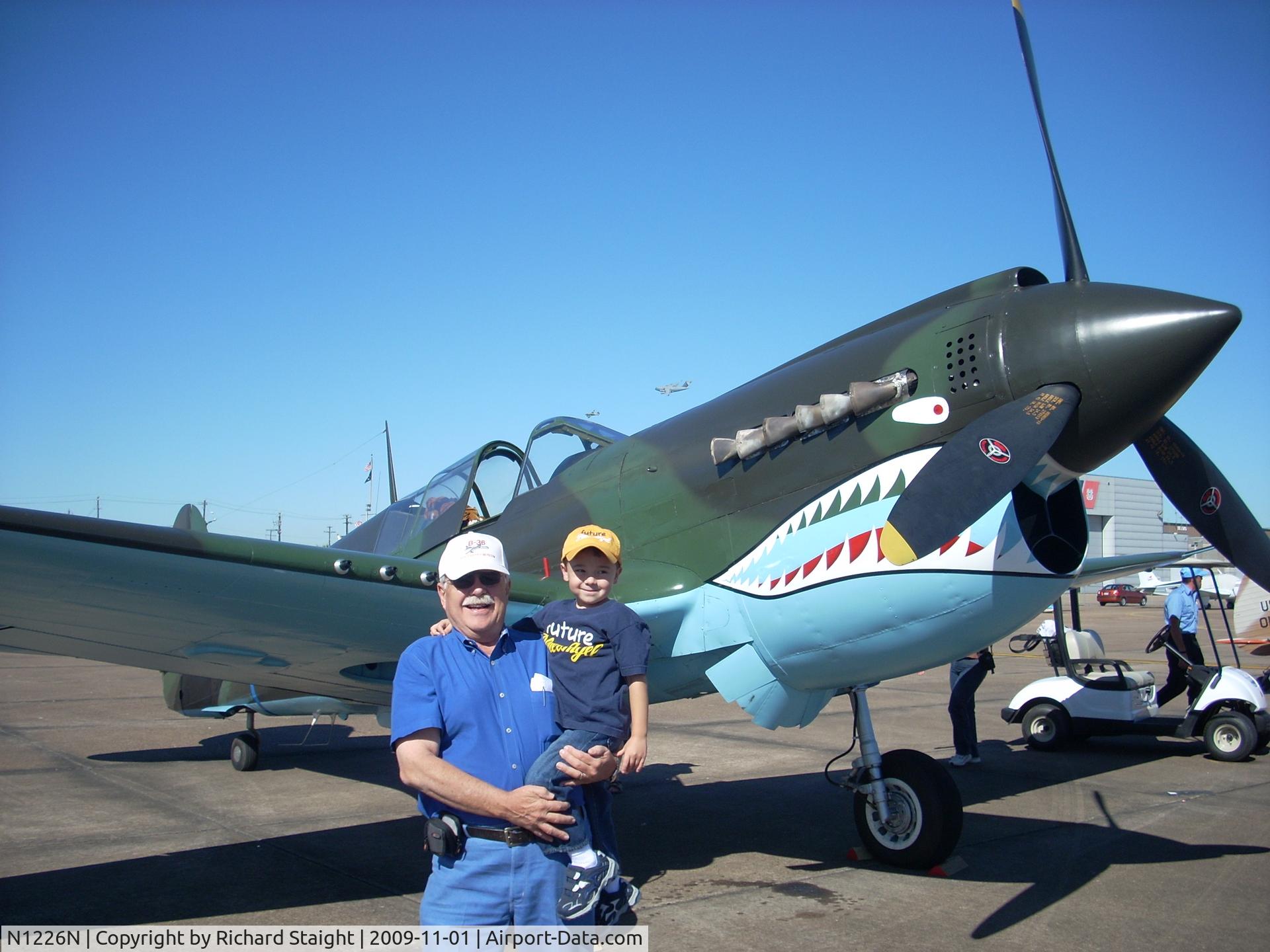 N1226N, Curtiss P-40N Warhawk C/N 29629, This is the same aircraft in 2009 with my grandson and me at the Wings Over Houston Airshow in 2009