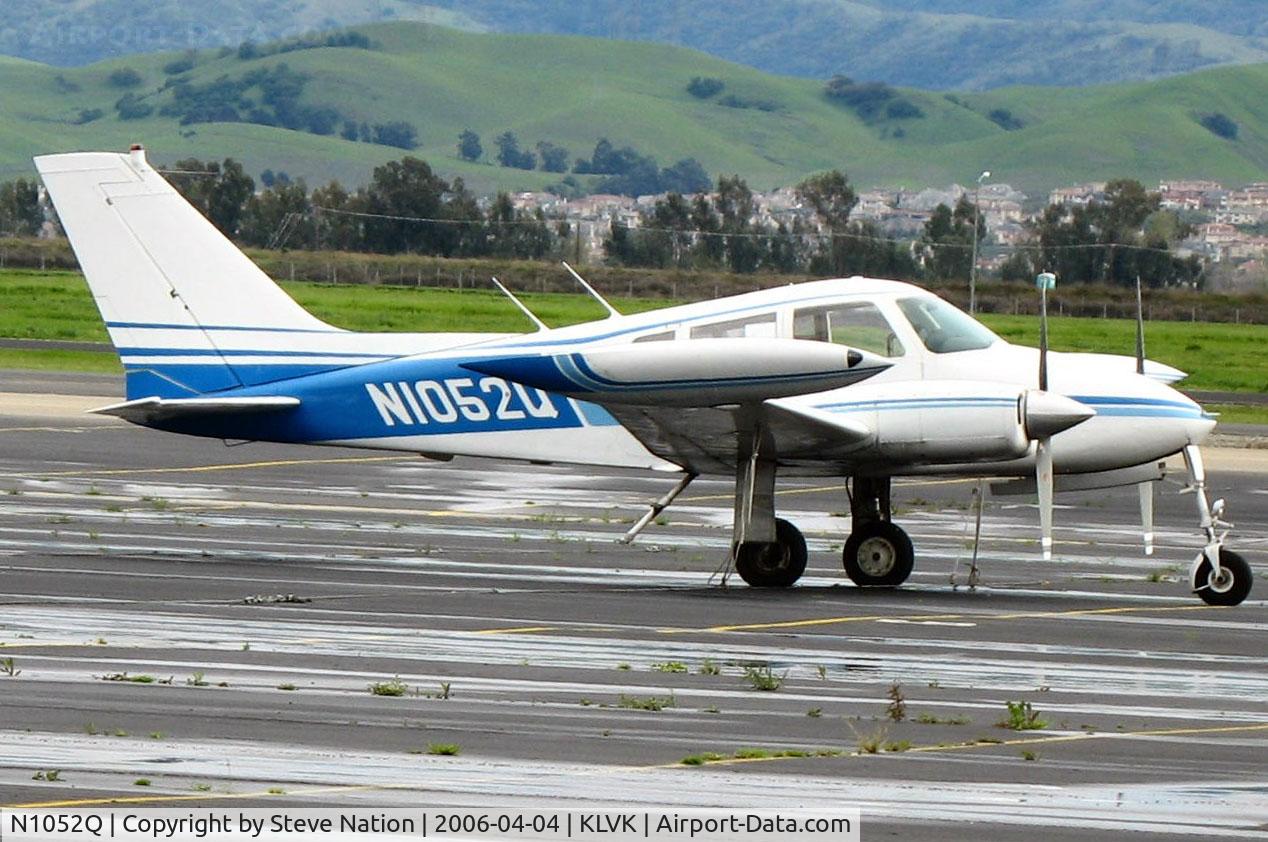 N1052Q, 1963 Cessna 310H C/N 310H0052, Locally-based 1963 Cessna 310H @ Livermore, CA after the rain