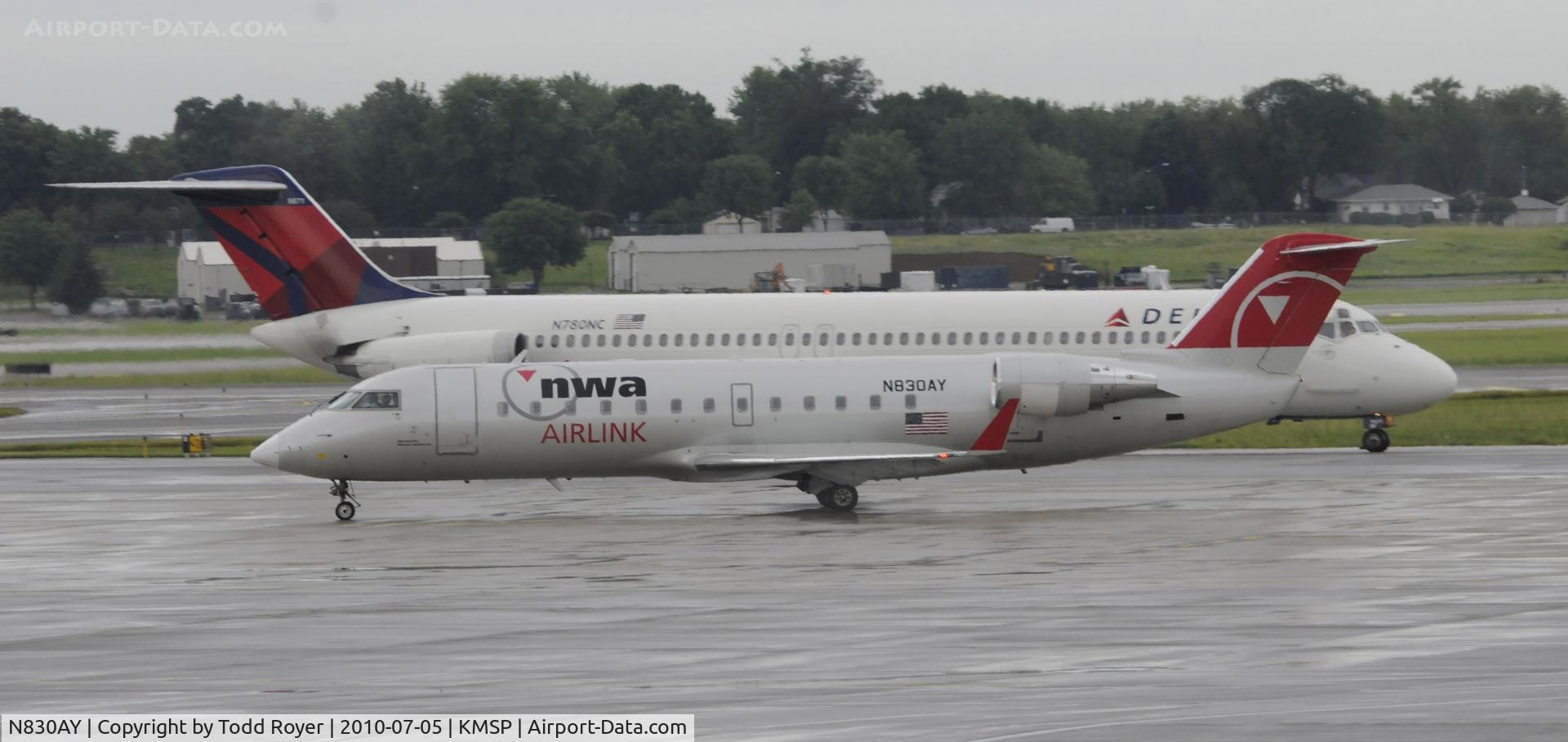 N830AY, 2005 Bombardier CRJ-200ER (CL-600-2B19) C/N 8030, Stormy day in MSP