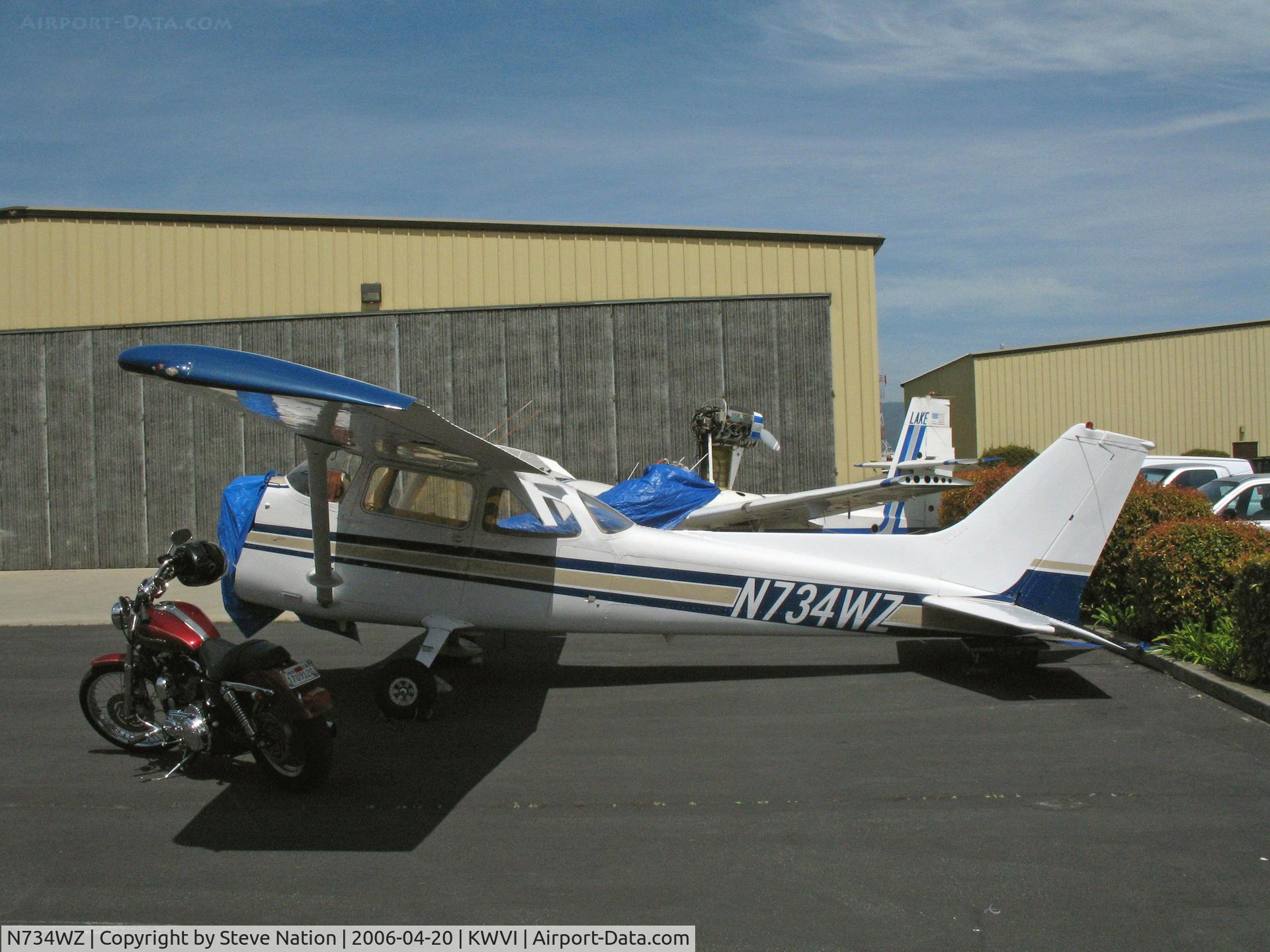 N734WZ, 1977 Cessna 172N C/N 17269185, Wannabe tail-dragger - engineless, blue tarped 1977 Cessna 172N @ Watsonville, CA (to Audio FX, Portland, OR by Jun 2009)