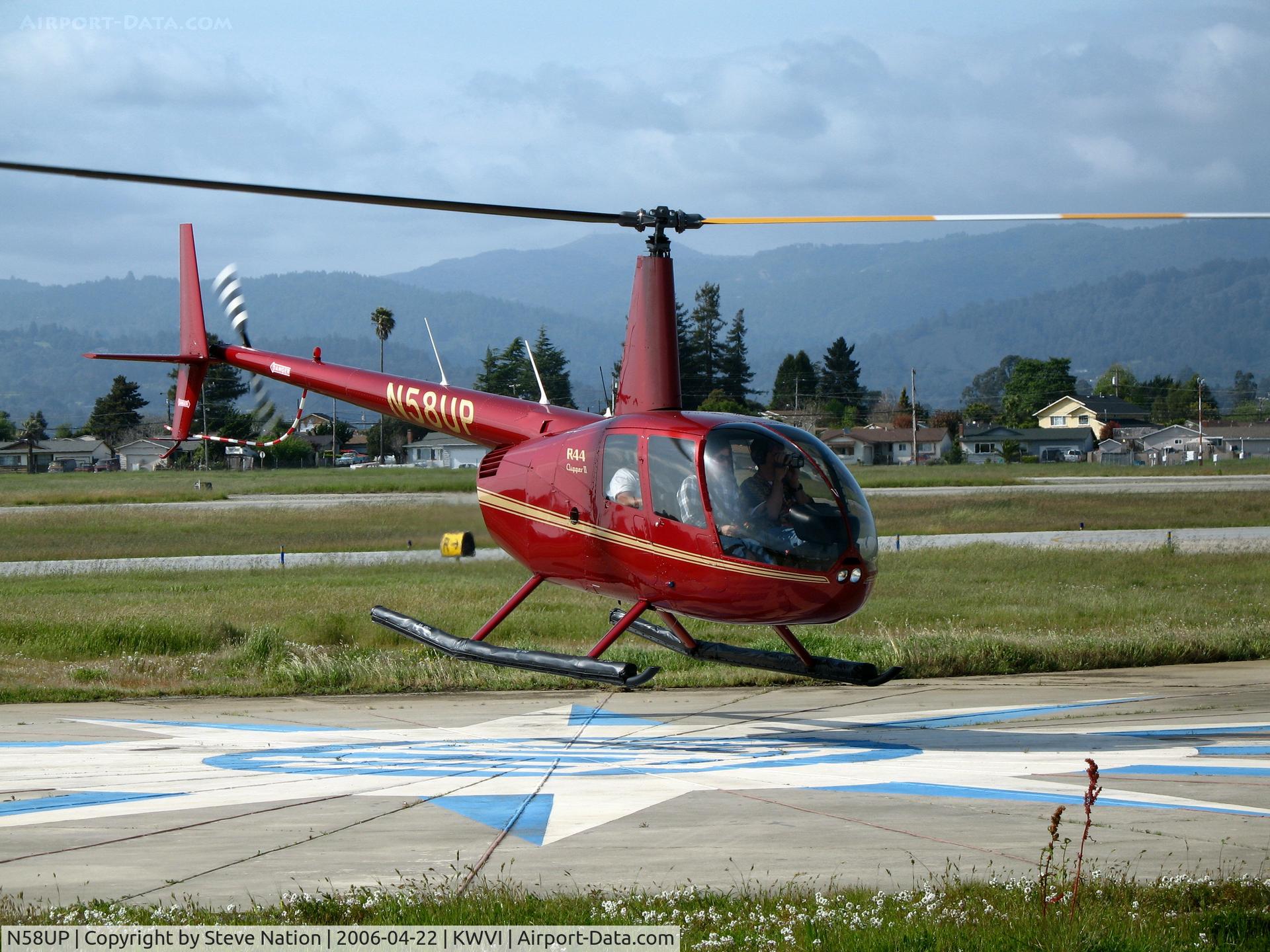 N58UP, 2005 Robinson R44 II C/N 10701, 2005 Robbie R44 II hovering @ Watsonville, CA