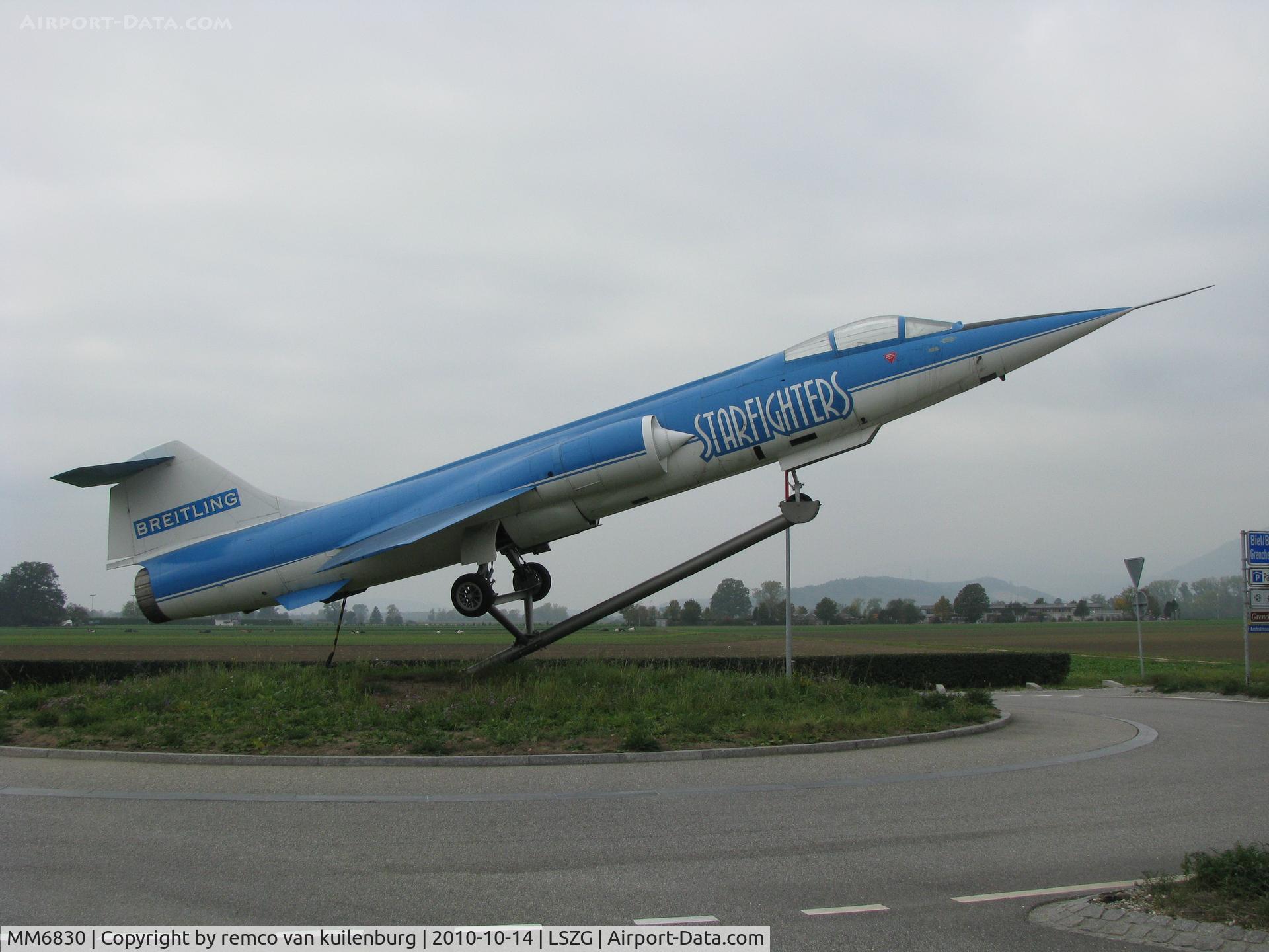 MM6830, Aeritalia F-104S-ASA Starfighter C/N 1130, preserved at roundabout in Breitling advertisement c/s. Wears no serial outside