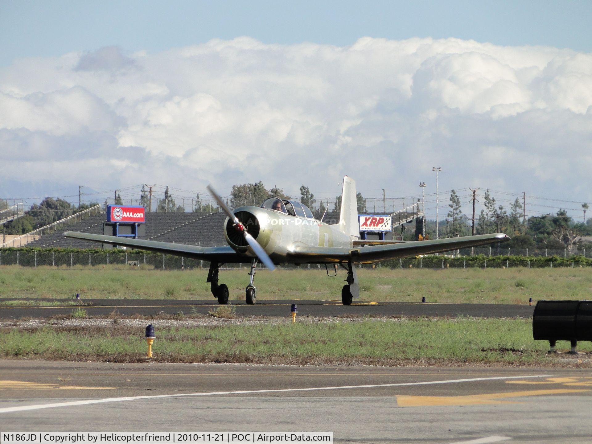 N186JD, 1973 Nanchang CJ-6A C/N 2851250, Taxiing on taxiway Sierra towards the Admin Building