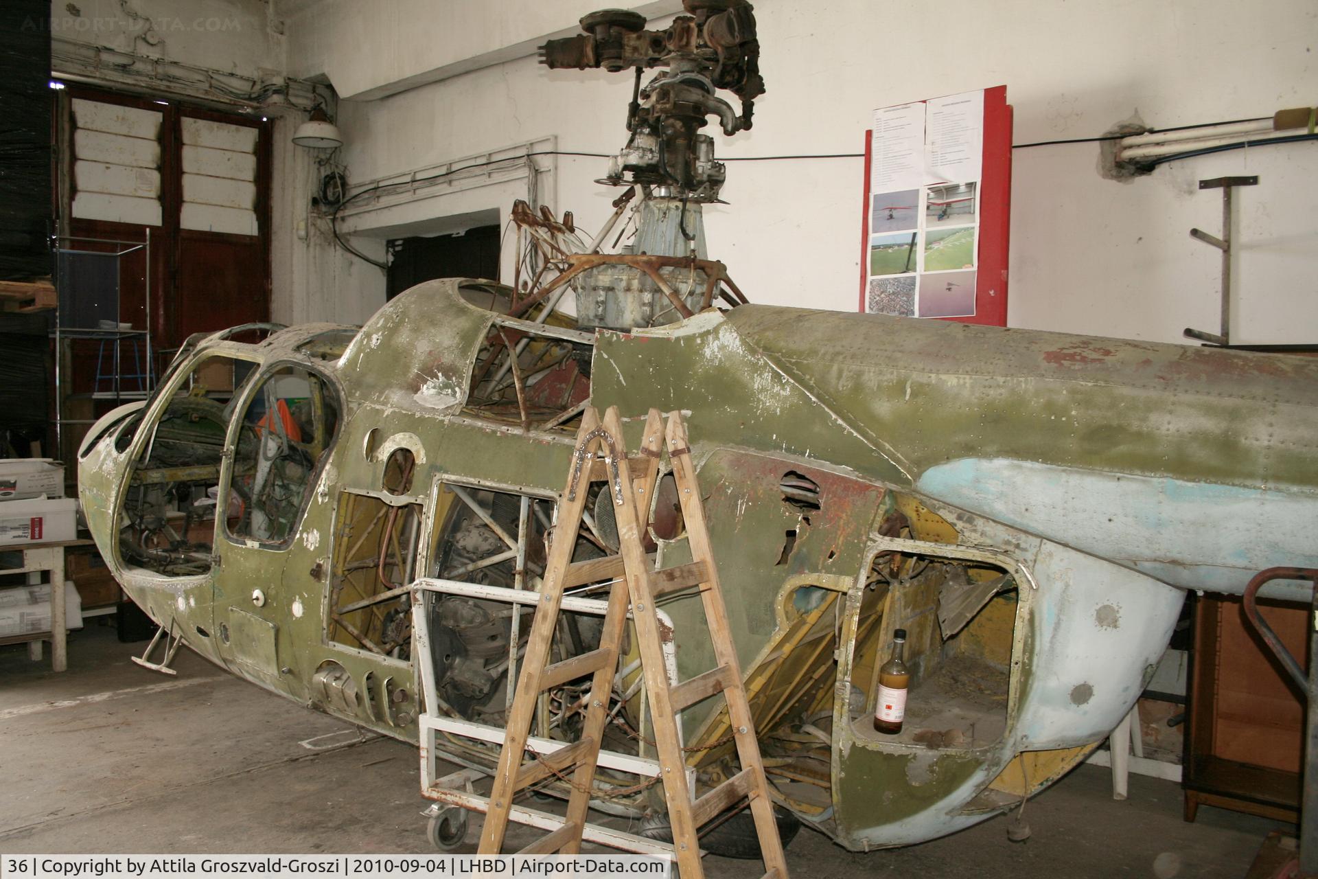 36, 1962 Mil Mi-1M C/N W04036, Börgönd Airport - During a renovation.