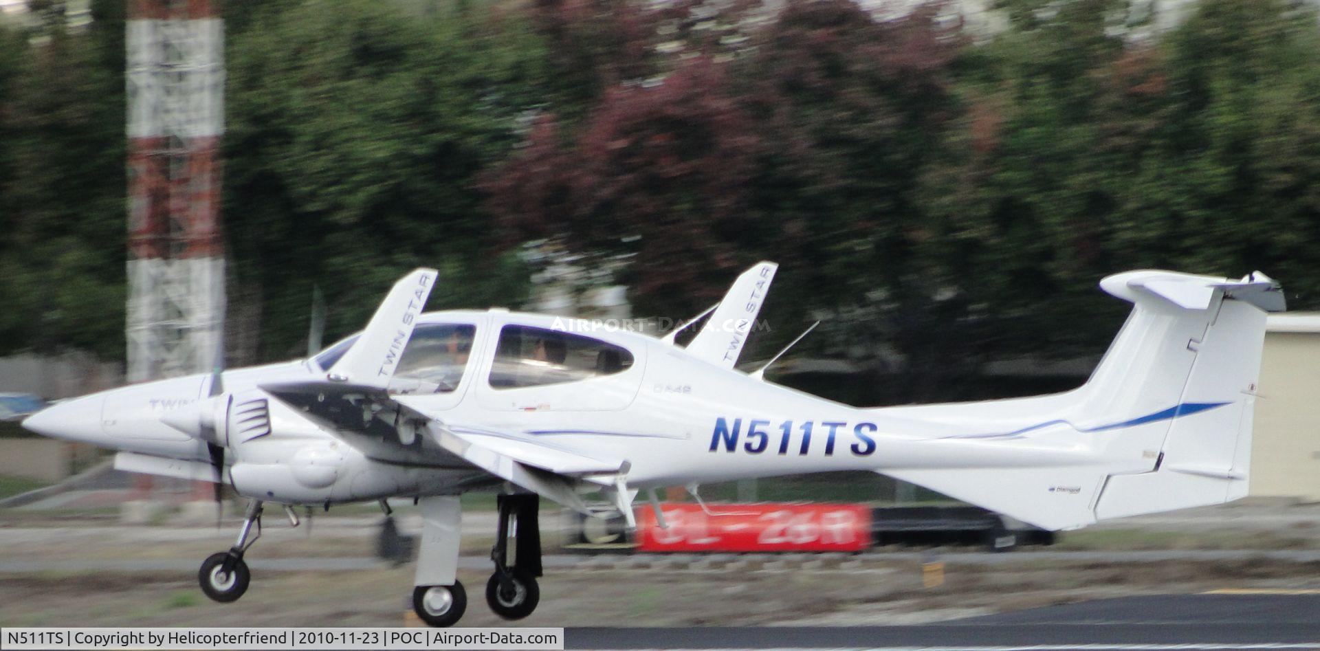 N511TS, 2007 Diamond DA-42 Twin Star C/N 42.AC102, Touching down after taxiway Coco on runway 26L