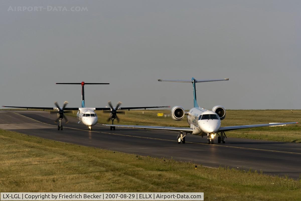 LX-LGL, 2005 Embraer ERJ-135LR (EMB-135LR) C/N 14500893, taxying to the active