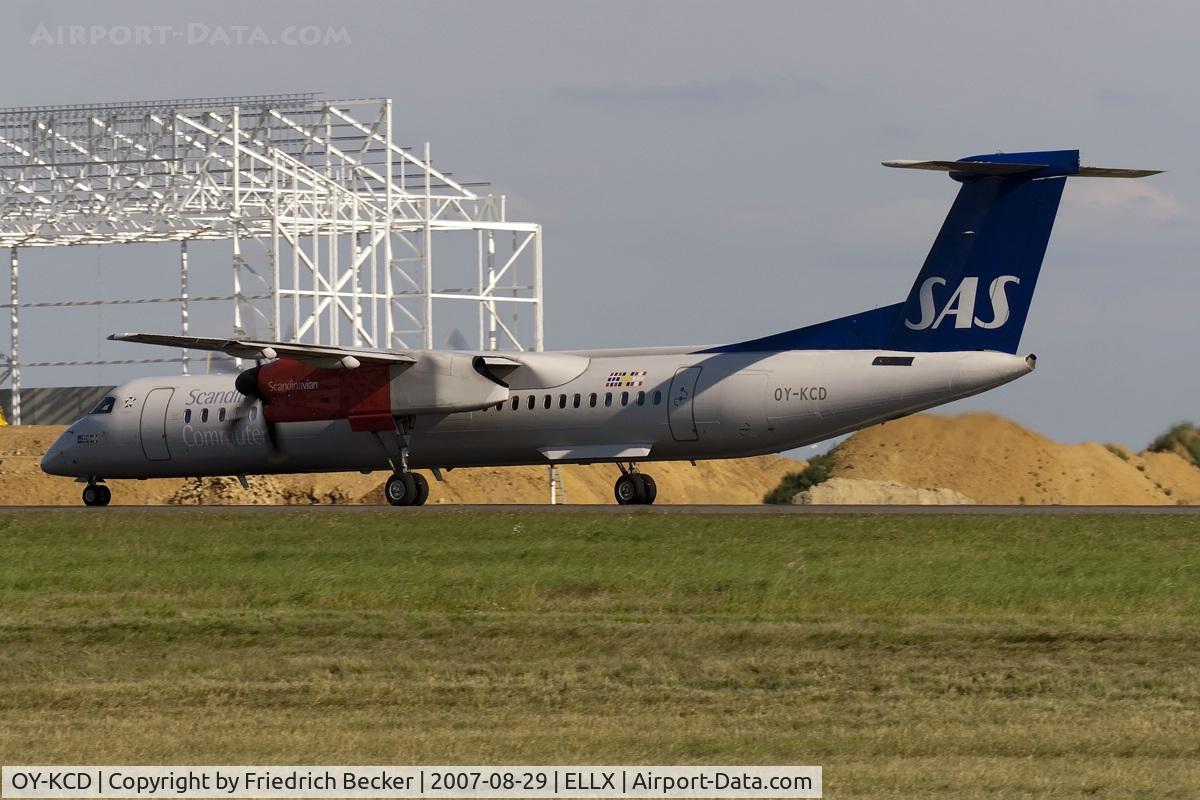OY-KCD, 2001 De Havilland Canada DHC-8-402Q Dash 8 C/N 4062, departure via RW06