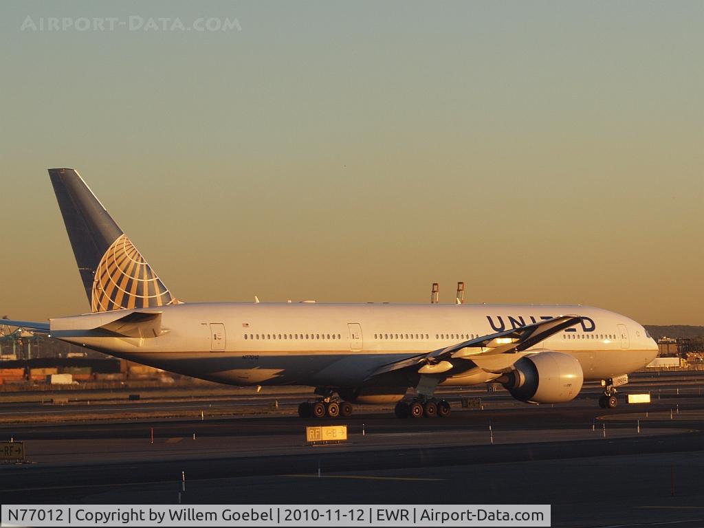 N77012, 1999 Boeing 777-224 C/N 29860, New colours of United and Continental Airlines