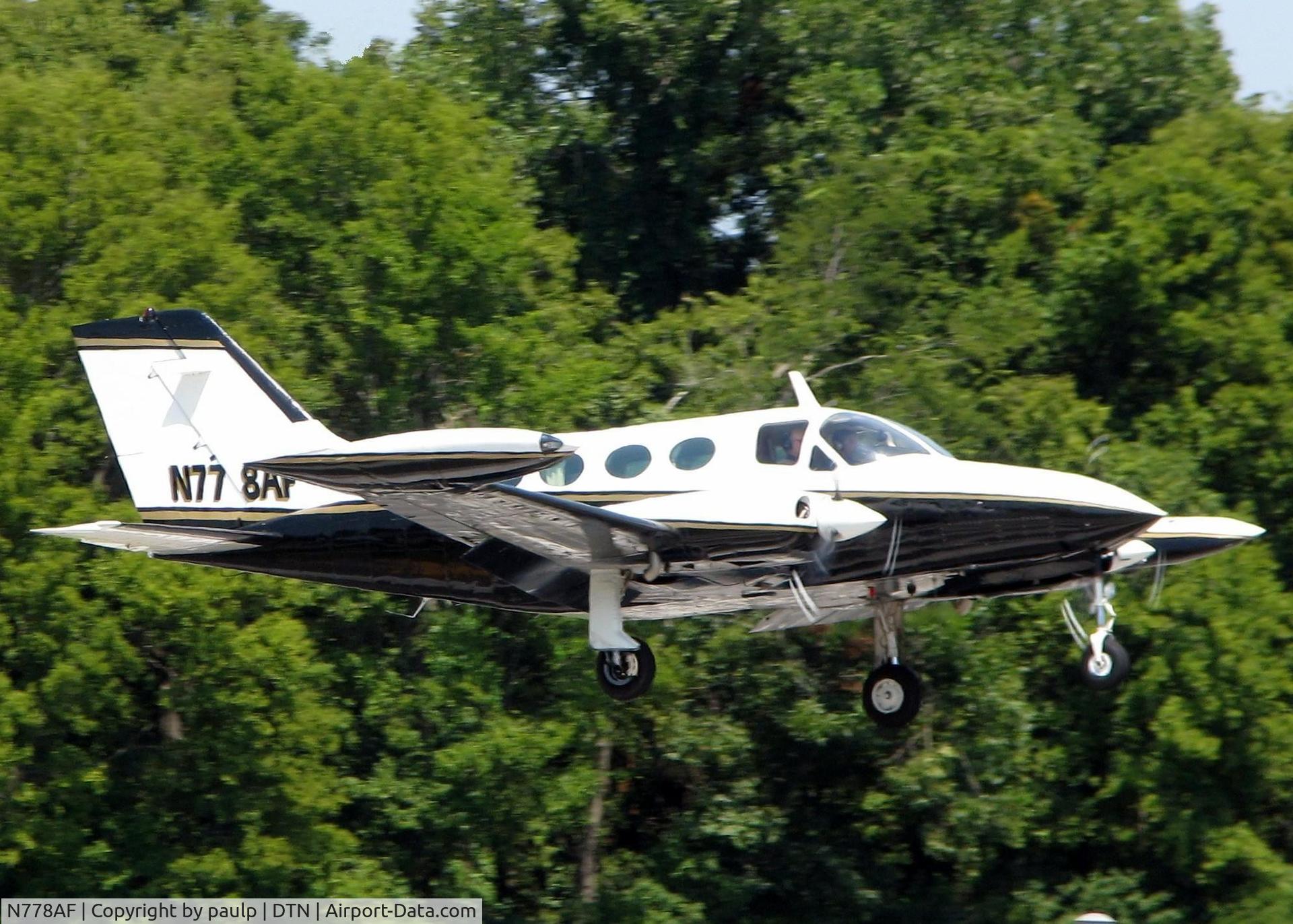 N778AF, 1970 Cessna 414 Chancellor C/N 414-0060, Touching down on 14 at Downtown Shreveport.