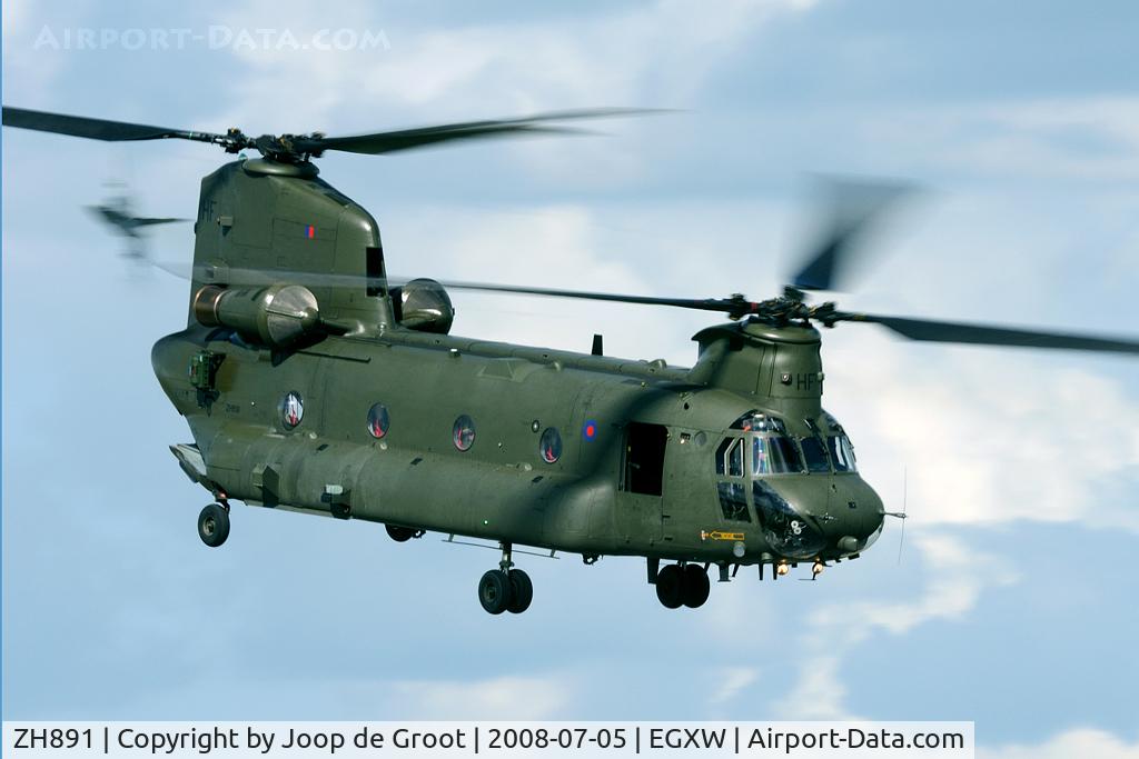 ZH891, 1997 Boeing Chinook HC.6A C/N M4454, role display at the Waddington air show. To the left a Tornado is about to overtake the Chinook.