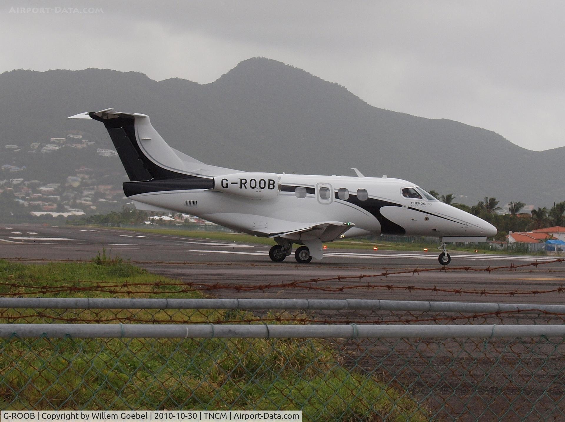 G-ROOB, 2010 Embraer EMB-500 Phenom 100 C/N 50000179, Ready for take off of Prinses Juliana Airport st Maarten