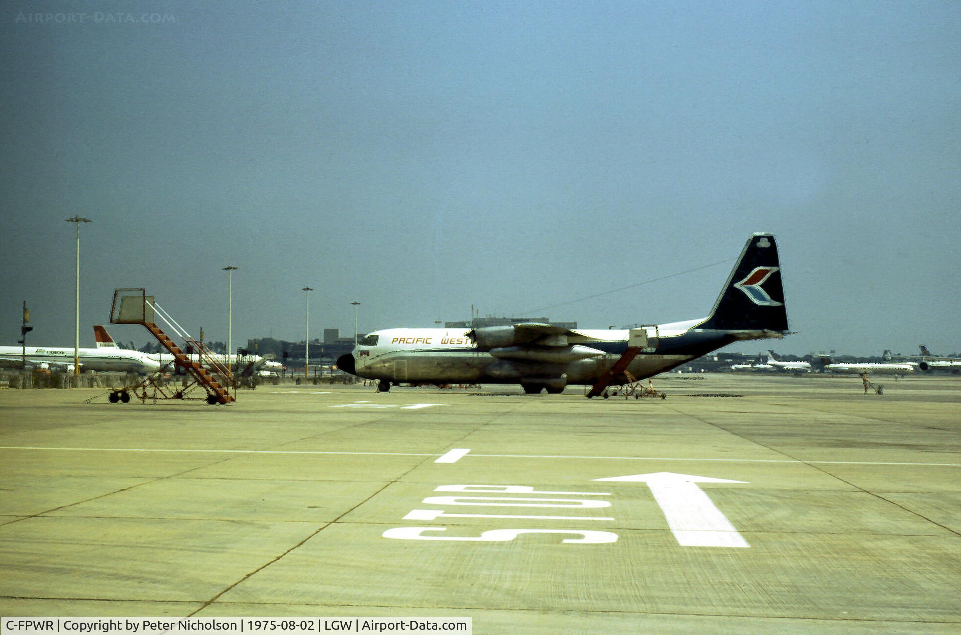 C-FPWR, 1969 Lockheed L-100-20 Hercules C/N 382-4355, Hercules of Pacific Western Airlines seen at London Gatwick in the Summer of 1975.