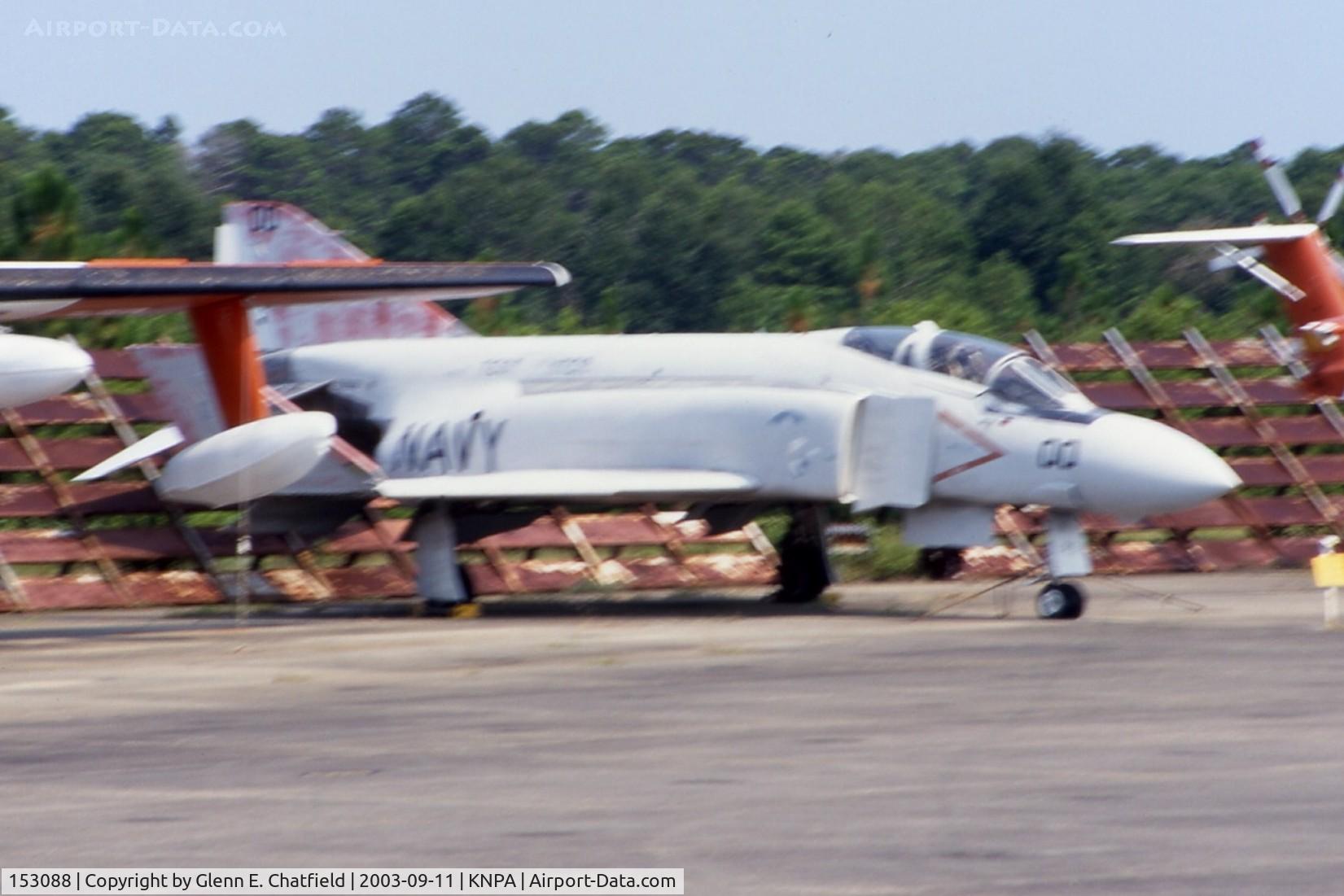 153088, McDonnell F-4J Phantom II C/N 1683, A bit fuzzy, photographed from a moving bus.  Shot down a MiG-17 on 6/11/72.  Displayed here at the National Museum of Naval Aviation before being repainted and sent to New York