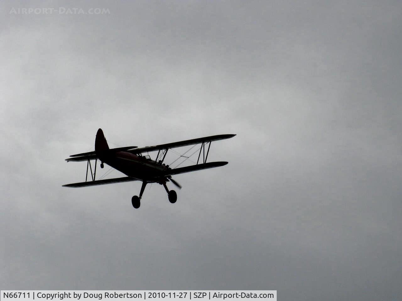 N66711, 1941 Boeing IB75A C/N 75-1675, 1941 Boeing Stearman IB75A, Jacobs R-755 B2 275 Hp upgrade, Experimental class total restoration, takeoff climb Rwy 22