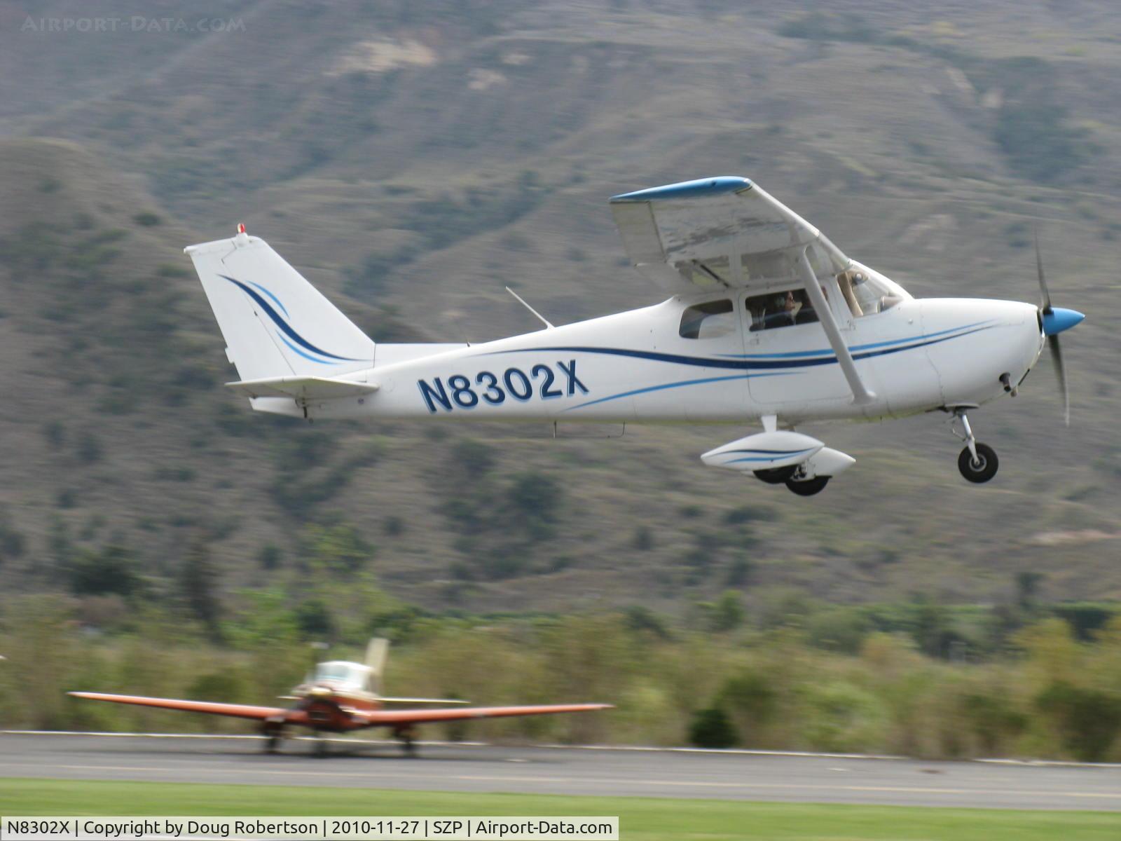 N8302X, 1961 Cessna 172C C/N 17248802, 1961 Cessna 172C, Continental O-300 145 Ho, takeoff climb Rwy 22