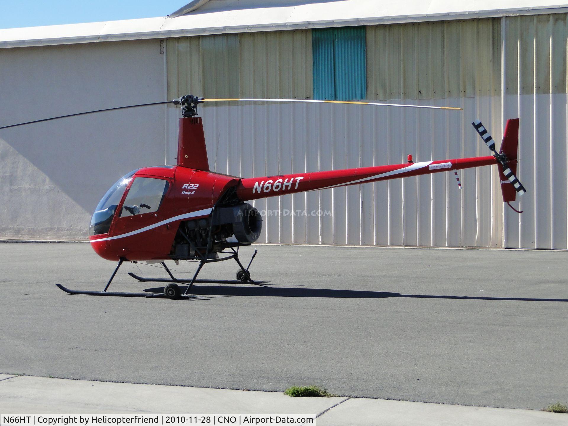 N66HT, 2000 Robinson R22 Beta II C/N 3049, Parked on the west end next to a hanger