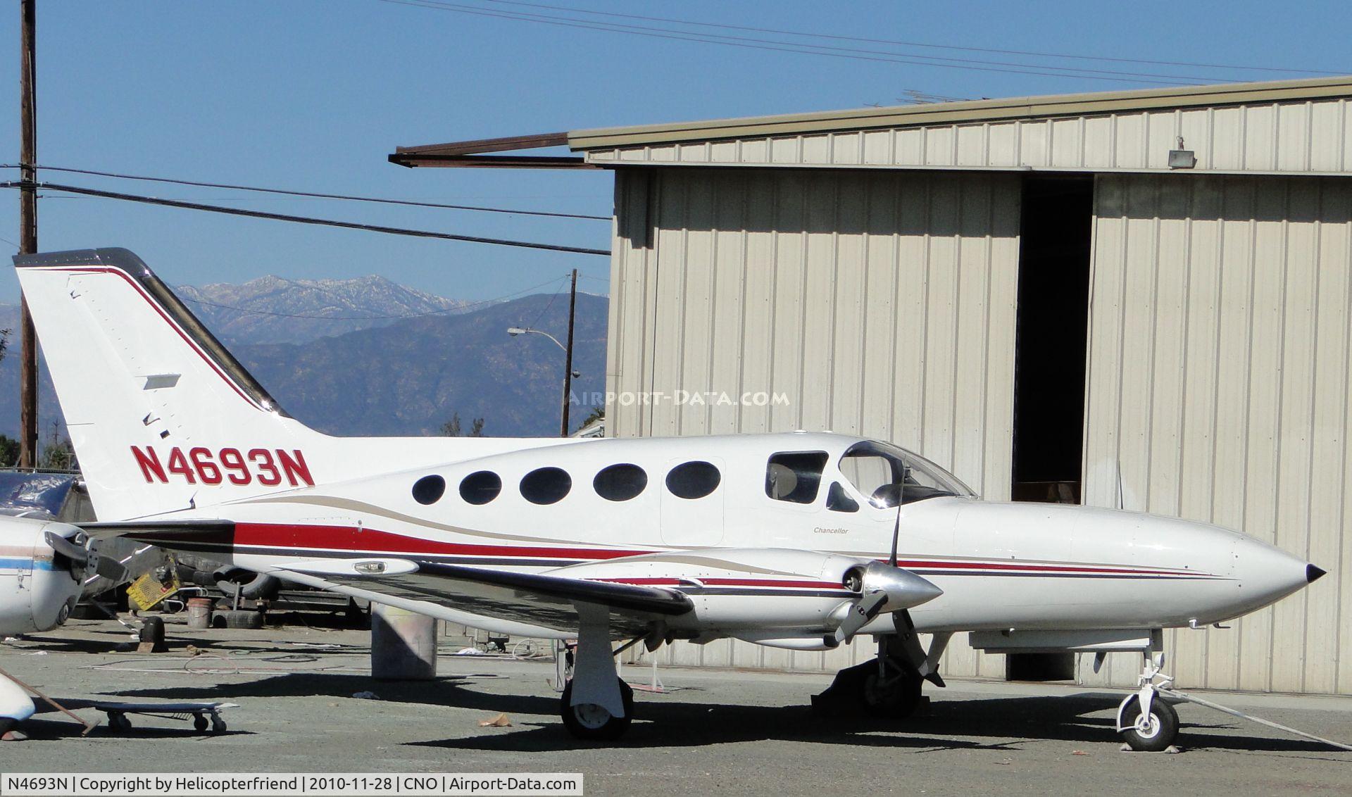 N4693N, Cessna 414A Chancellor C/N 414A0079, Parked outside the paint shop area in the fenced in area