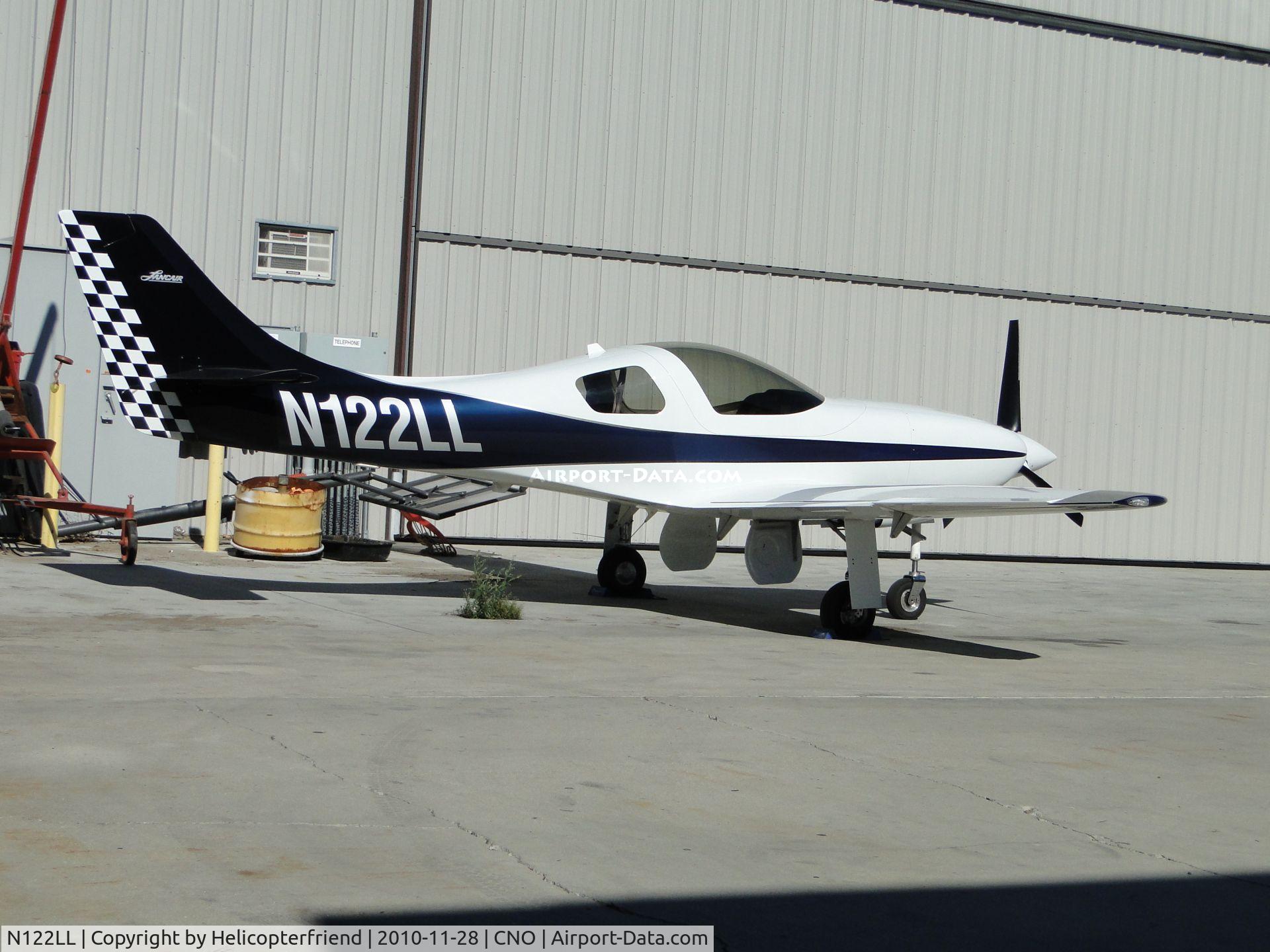 N122LL, 2003 Lancair Legacy 2000 C/N L2K-114, Parked next to a hanger
