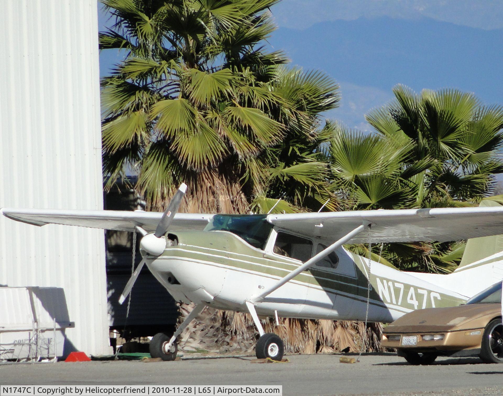 N1747C, 1953 Cessna 180 C/N 30447, Parked next to the hanger south of the runway