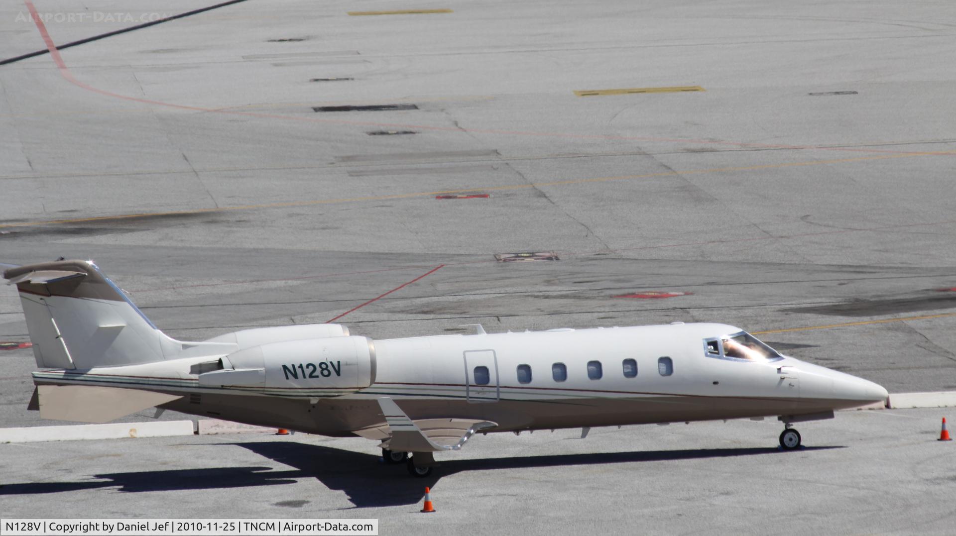 N128V, 2001 Learjet 60 C/N 226, Priester N128V park at the main ramp at TNCM