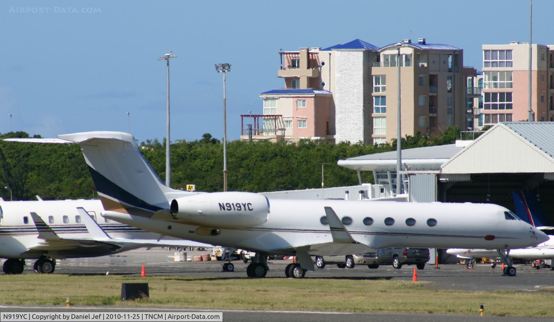 N919YC, Gulfstream Aerospace G-V C/N 682, N919YC park on the ramp at TNCM
