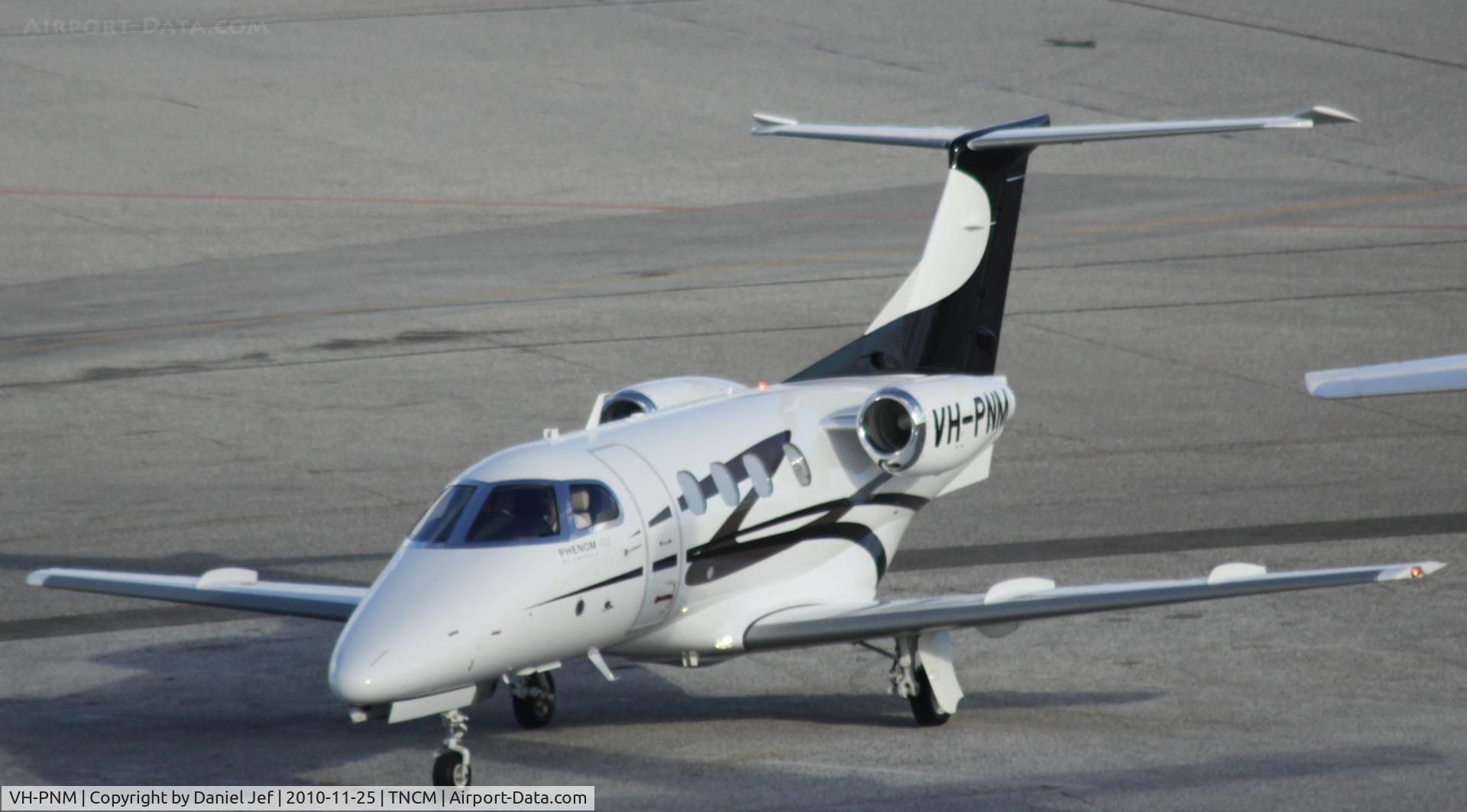 VH-PNM, 2010 Embraer EMB-500 Phenom 100 C/N 50000206, VH-PNM taxing the parking at TNCM