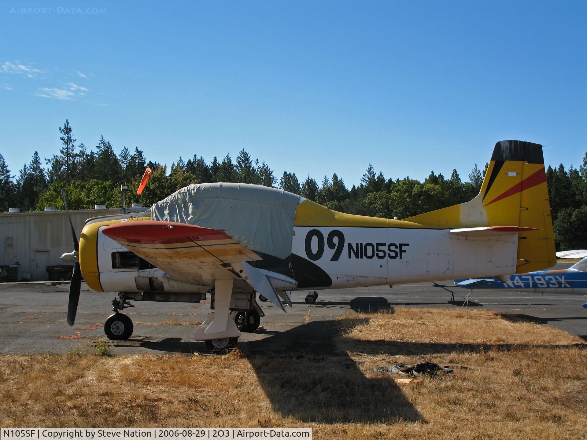 N105SF, North American T-28B Trojan C/N 200-412 (138341), North American T-28B with canopy cover and race # 09 @ Parrett Field, Angwin, CA (with owner in Jean, NV by Aug 2009)