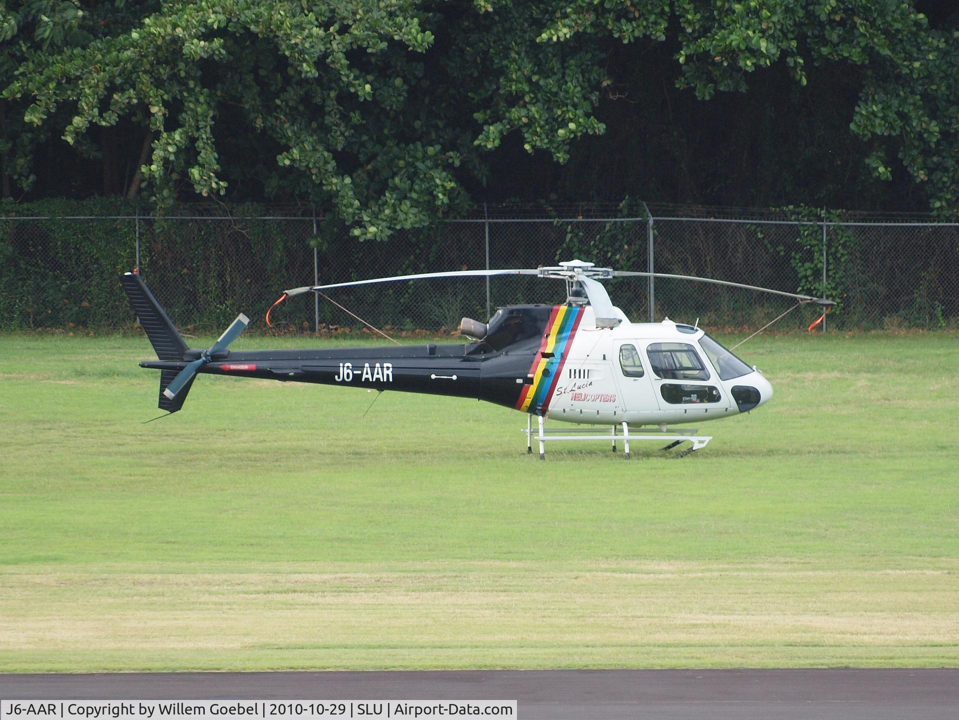 J6-AAR, Aerospatiale AS-350B Ecureuil C/N 3869, Parking on airstrip from Castries on st Lucia.(st Lucia Helicopters AS350B c/n3869