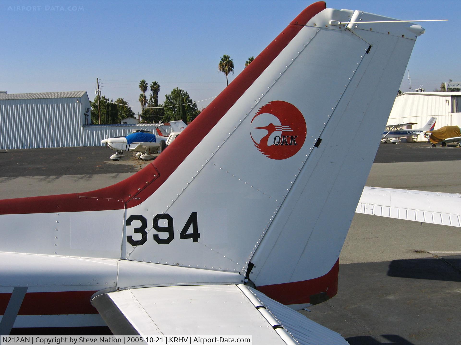 N212AN, 1981 Cessna 172P C/N 17274432, Close-up of tail on Locally-based 1981 Cessna 172P operated by Nice Air with red crane and OKK on tail and #394 @ Reid-Hillview Airport, San Jose, CA