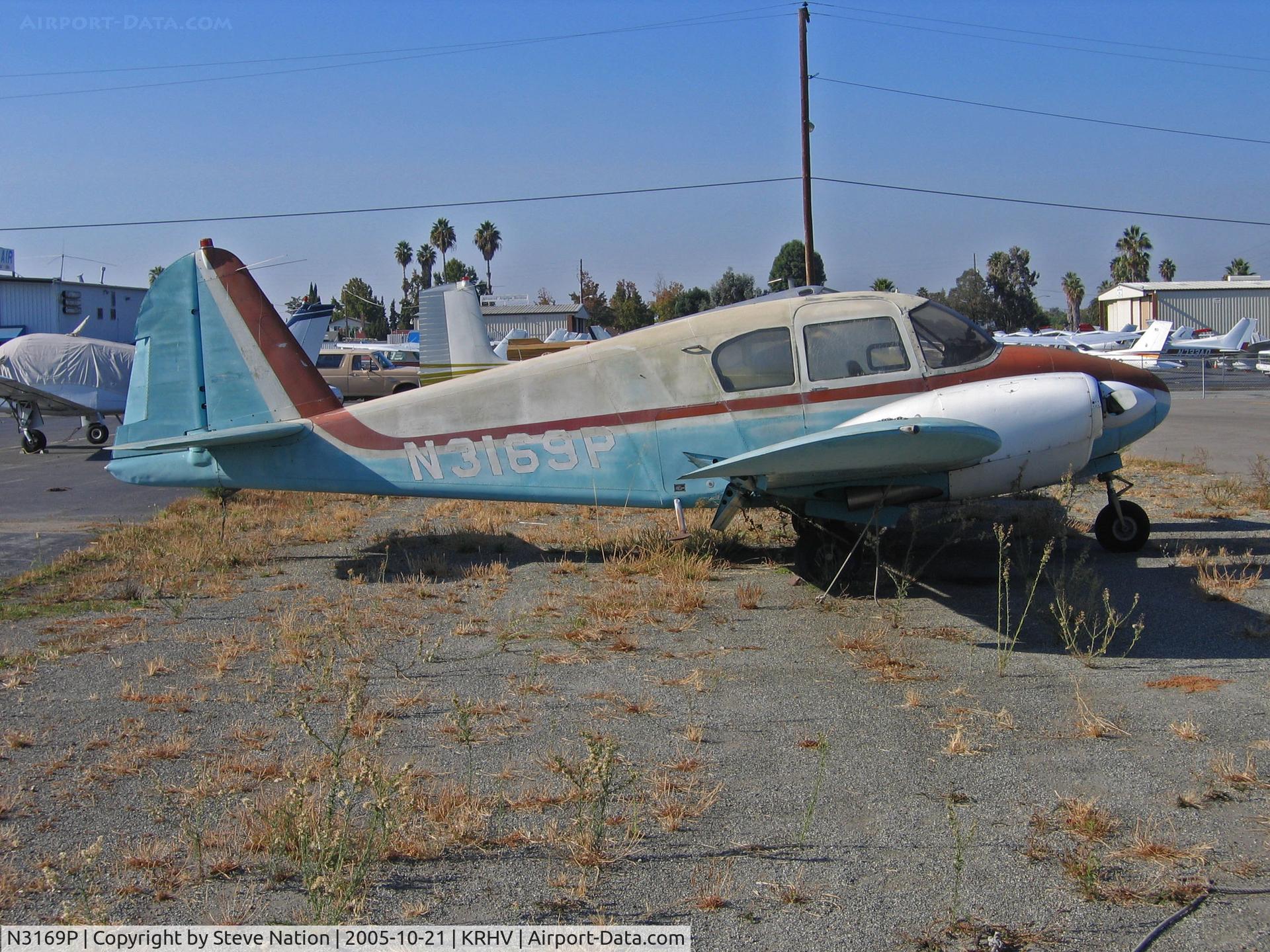 N3169P, 1957 Piper PA-23-160 Apache Apache C/N 23-1104, Locally-based 1957 Piper PA-23 in te weeds looking long in the tooth on a brilliant sunshine day @ Reid-Hillview (originally Reid's Hillview) Airport, San Jose, CA