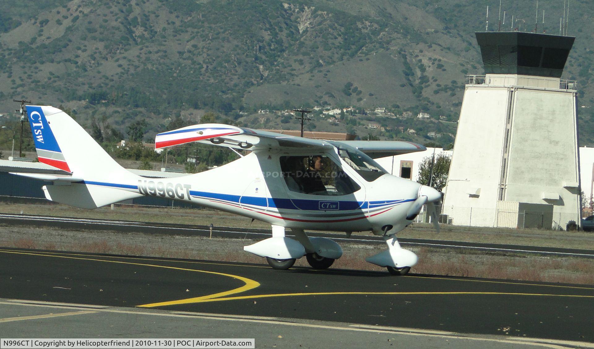 N996CT, 2006 Flight Design CTSW C/N 06-12-16, Taxiing eastbound on taxiway Sierra enroute to runway 26L for take off