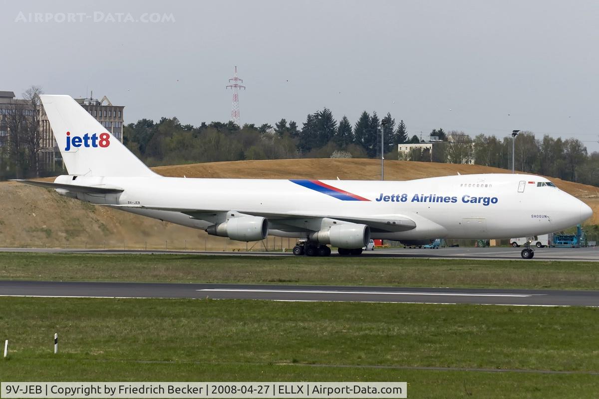 9V-JEB, 1985 Boeing 747-281F C/N 23350, taxying to the cargo center