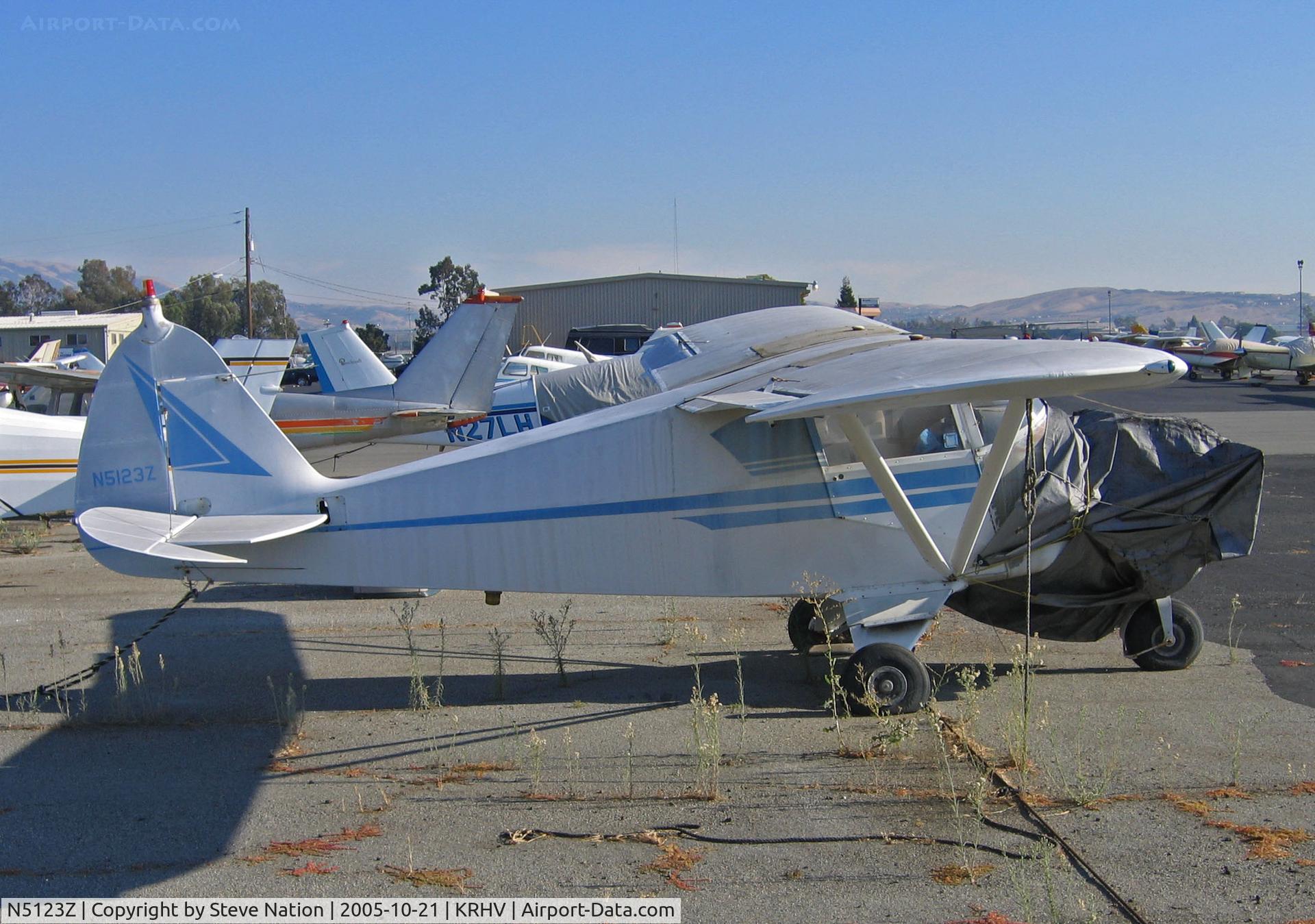 N5123Z, 1961 Piper PA-22-108 Colt C/N 22-8764, Locally-based 1961 Piper PA-22-108 with hefty bag hiding engine in bright sunshine @ Reid-Hillview Airport, San Jose, CA