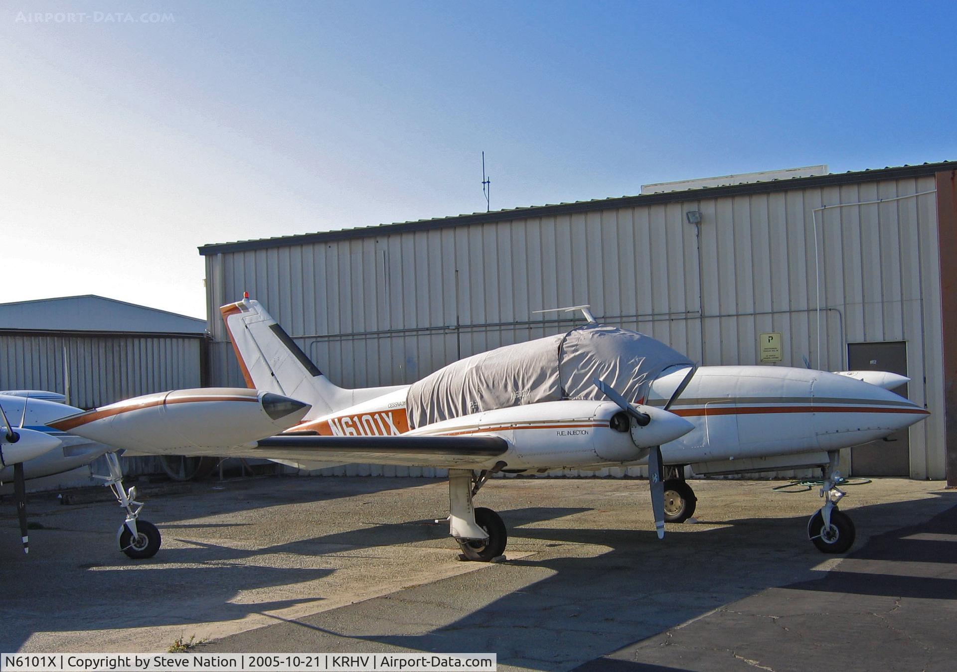 N6101X, 1978 Cessna 310R C/N 310R1267, Locally-based 1978 Cessna 310R with cockpit covered and in old (orange cheatline) color scheme poses in bright sunshine @ Reid-Hillview Airport, San Jose, CA