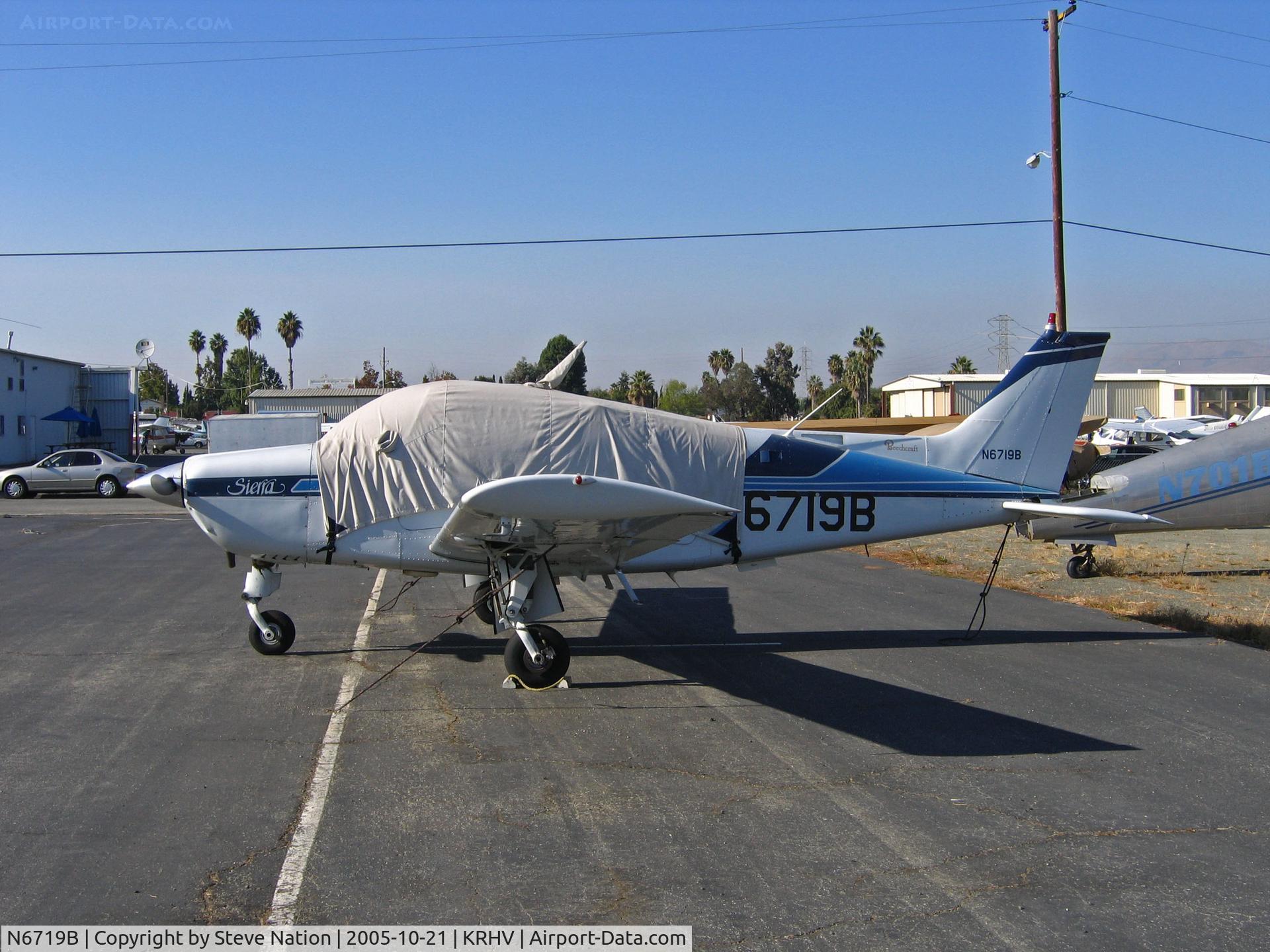 N6719B, 1981 Beech C24R C/N MC-729, Locally-based 1981 Beech C24R Sierra with cockpit covered and large and small registrations visible in bright sunshine @ Reid-Hillview Airport, San Jose, CA