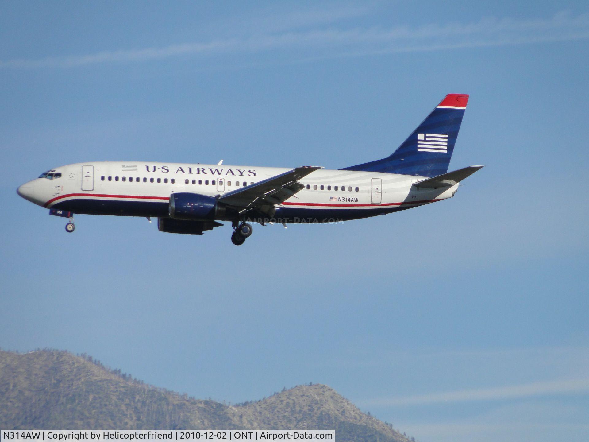 N314AW, 1987 Boeing 737-3S3 C/N 23733, On final to runway 26R