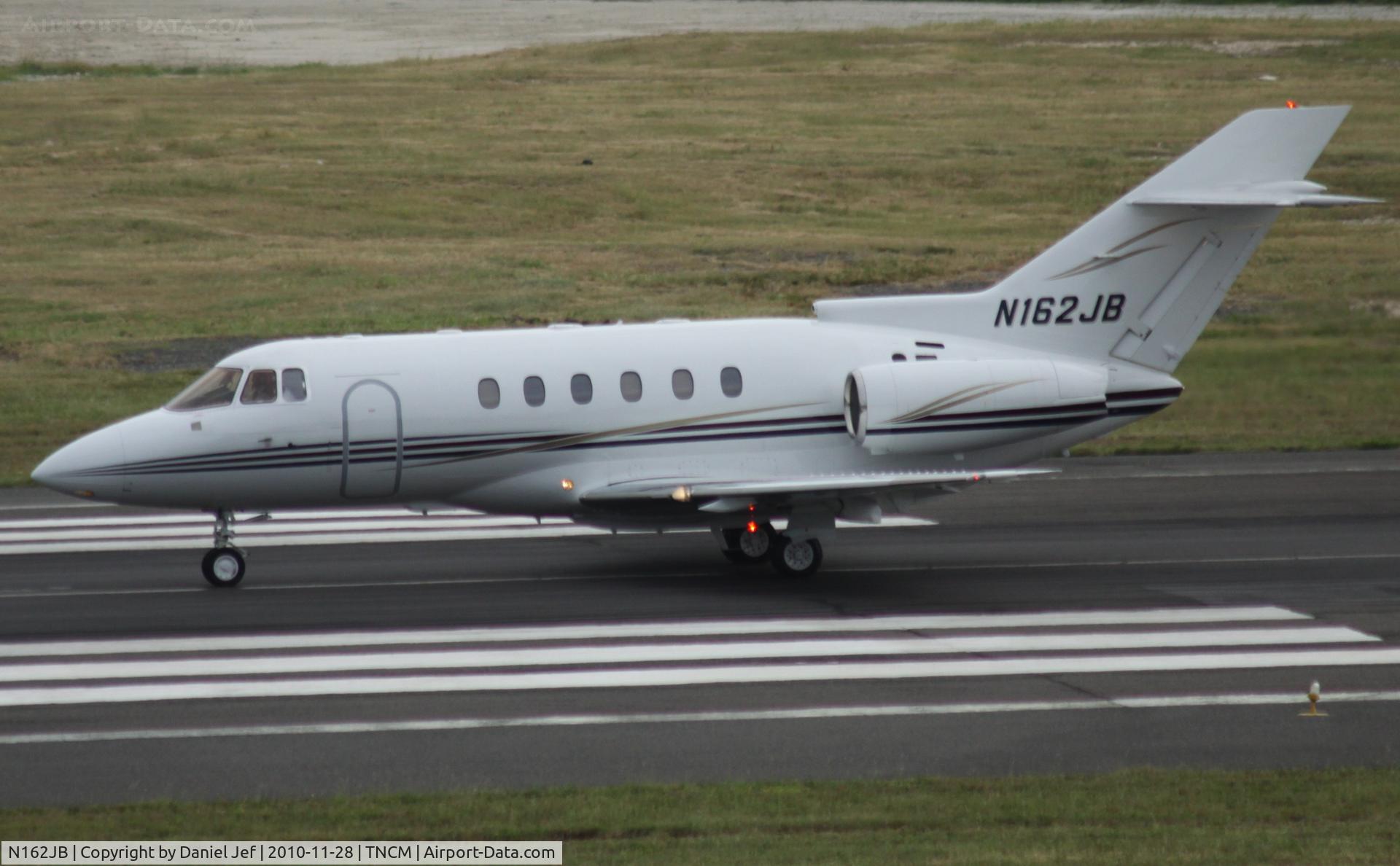 N162JB, 2001 Raytheon Hawker 800XP C/N 258509, N162JB departing TNCM runway 10