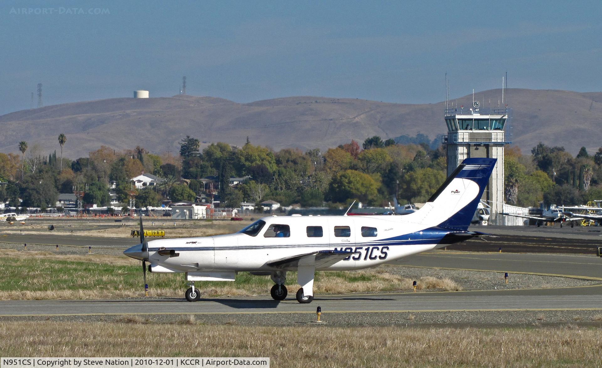 N951CS, 1999 Piper PA-46-350P Malibu Mirage C/N 4636212, Galloway Air (Charlotte, NC) 1999 Piper PA-46-350P taxis for take-off on RWY 1L for KSBA/Santa Barbara Municipal airport, CA with tower and hills in background @ Buchanan Field, Concord, CA