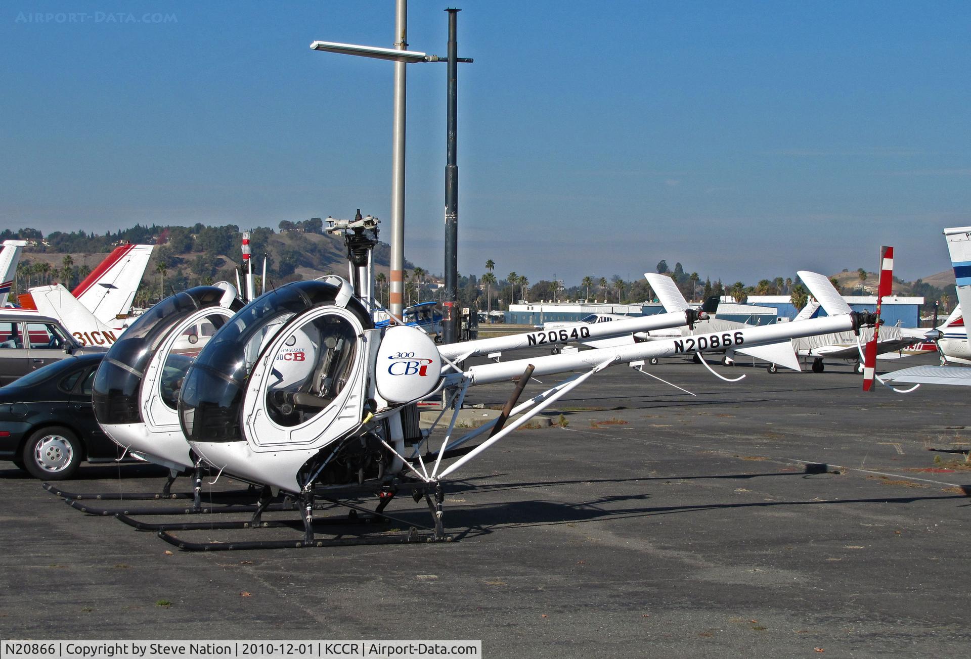 N20866, 2004 Schweizer 269C-1 C/N 0185, Bristow Academy 2004 Schweizer 269C-1 (along with N2064Q) minus rotor blades (heading for Bristow's Titusville, FL base for the winter?) @ Buchanan Field, Concord, CA