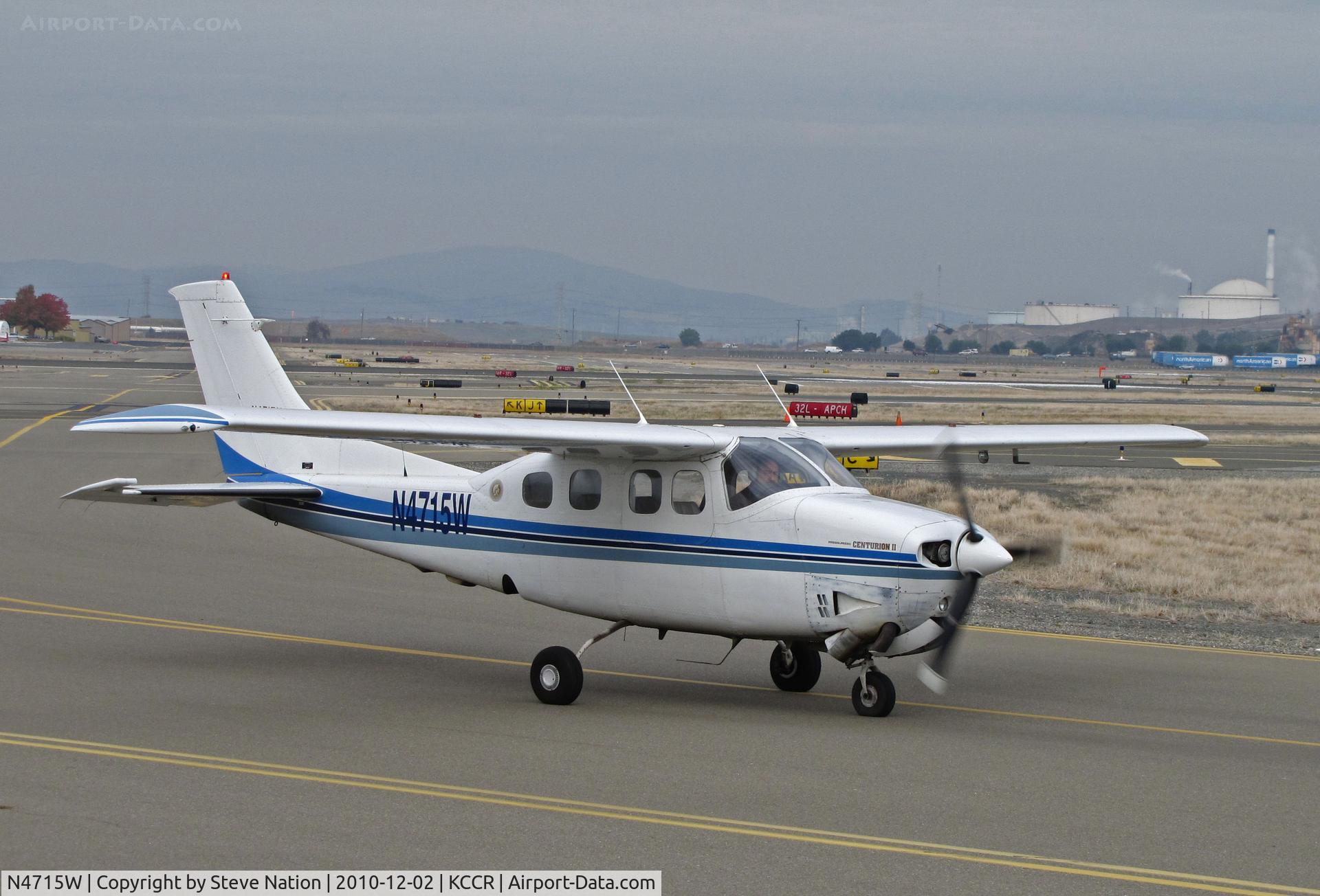 N4715W, 1980 Cessna P210N Pressurised Centurion C/N P21000624, Lake Havasu, AZ-based 1980 Cessna P210N (note dual registration) taxis for RWY 32R @ Buchanan Field, Concord, CA