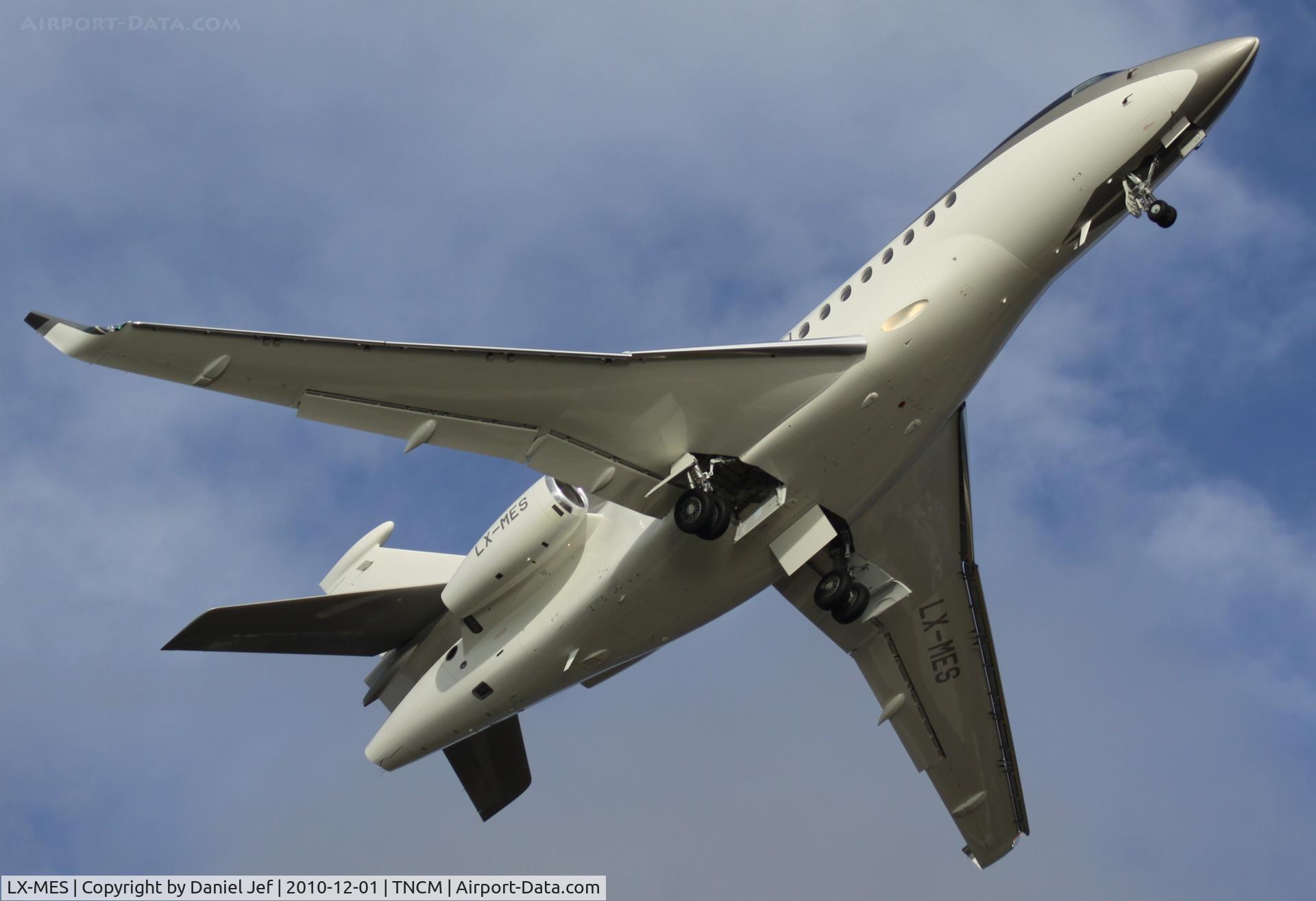 LX-MES, 2010 Dassault Falcon 7X C/N 097, A close up of Silver Arrows LX-MES departing TNCM