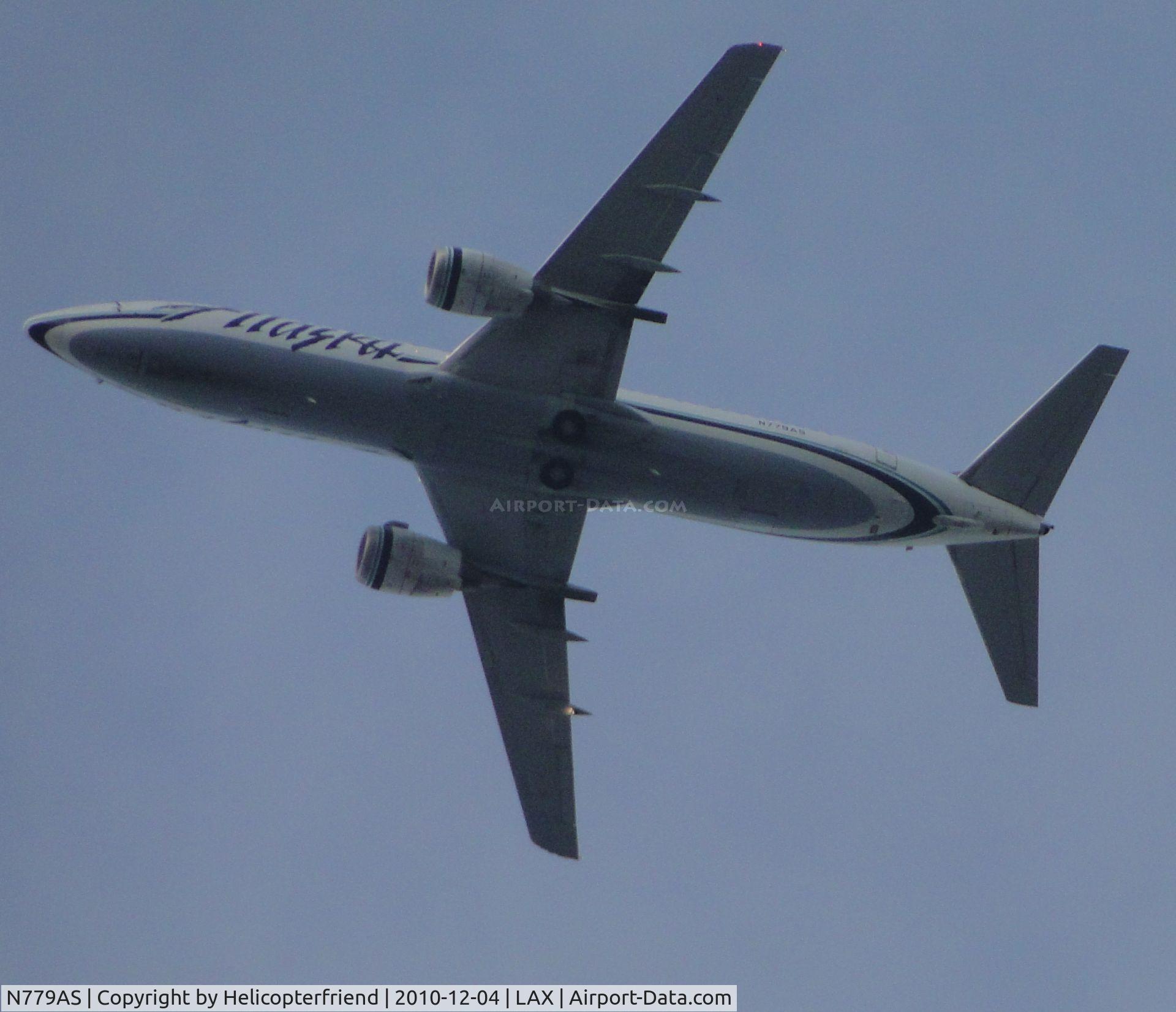 N779AS, 1994 Boeing 737-4Q8 C/N 25111, On Final to runway 24 flying over the City of Bell, Califonia, approximately 15 miles east of LAX