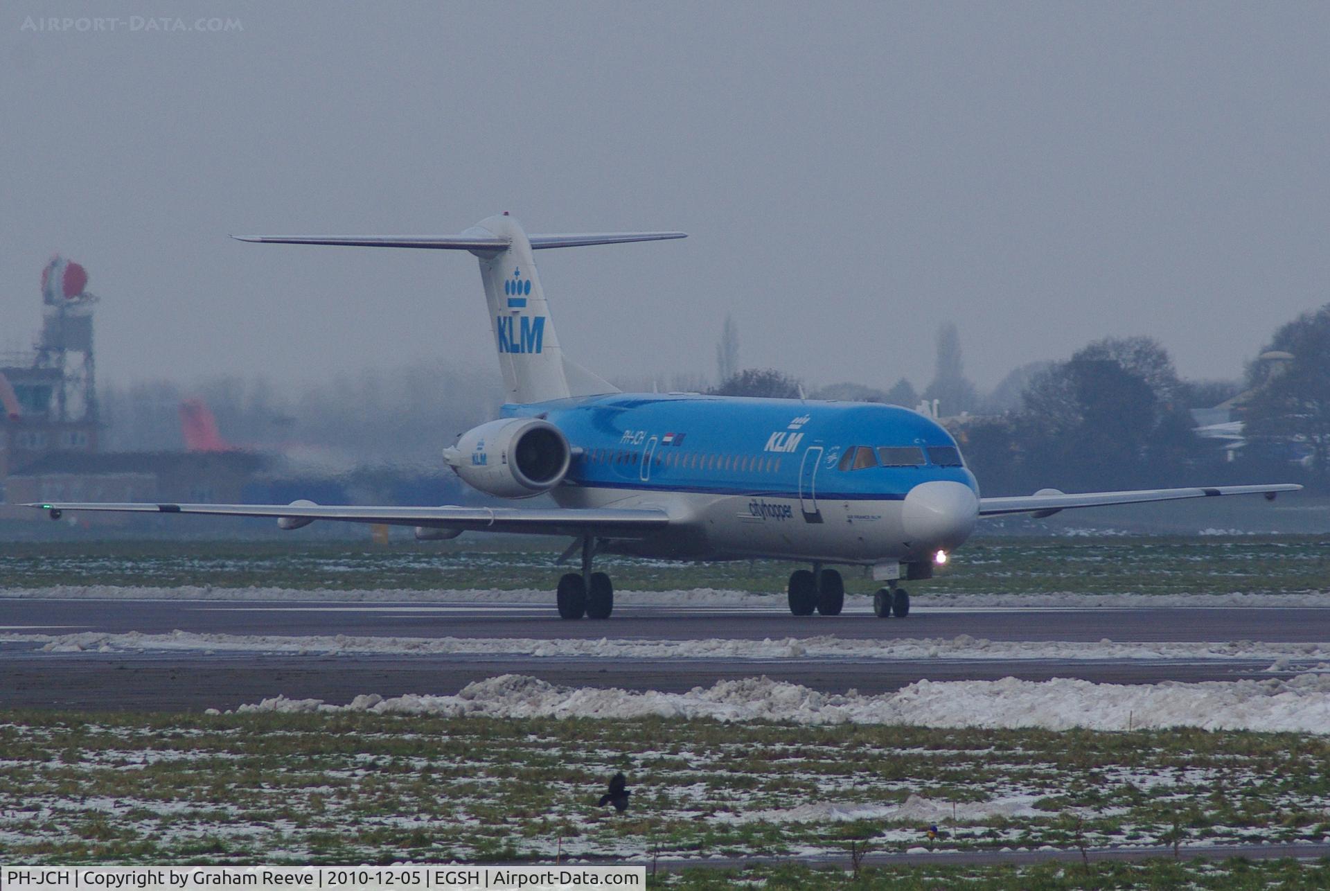 PH-JCH, 1994 Fokker 70 (F-28-0070) C/N 11528, About to depart on a snowy morning.