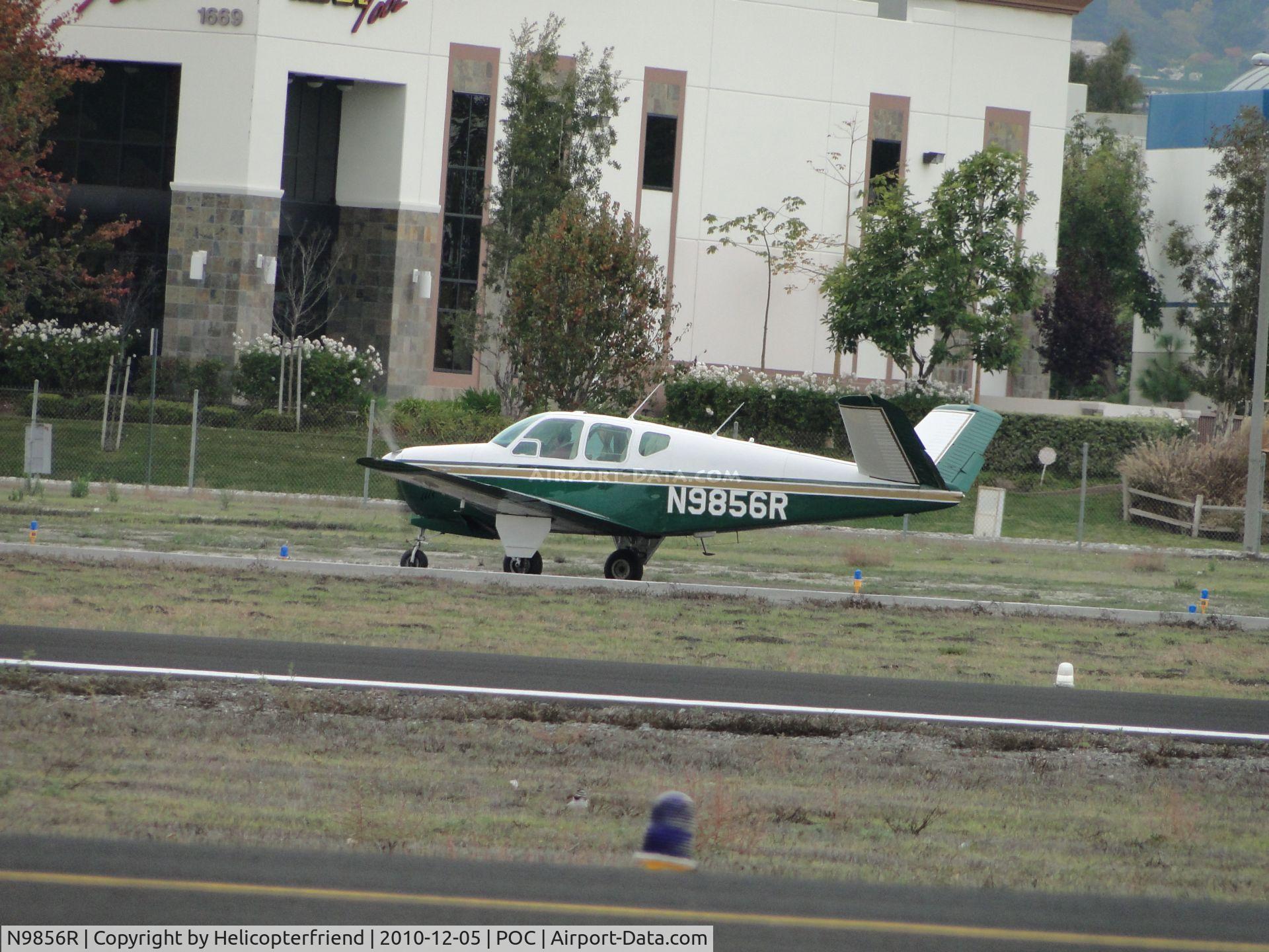 N9856R, 1960 Beech M35 Bonanza C/N D-6398, Rolling out after landing on runway 26R
